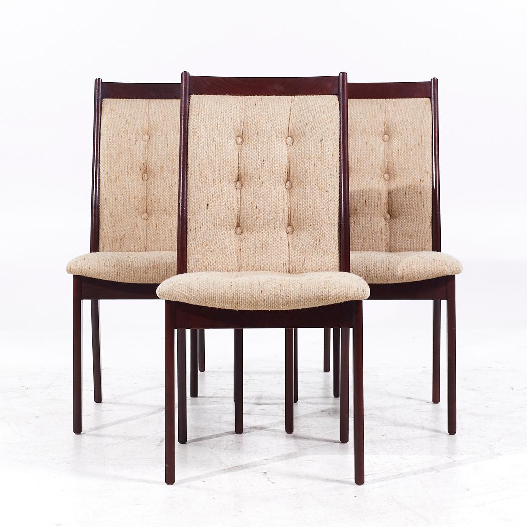 Mid Century Danish Rosewood Upholstered Dining Chairs - Set of 4

Each chair measures: 19 wide x 20.5 deep x 36.5 inches high, with a seat height/chair clearance of 17.5 inches

All pieces of furniture can be had in what we call restored vintage