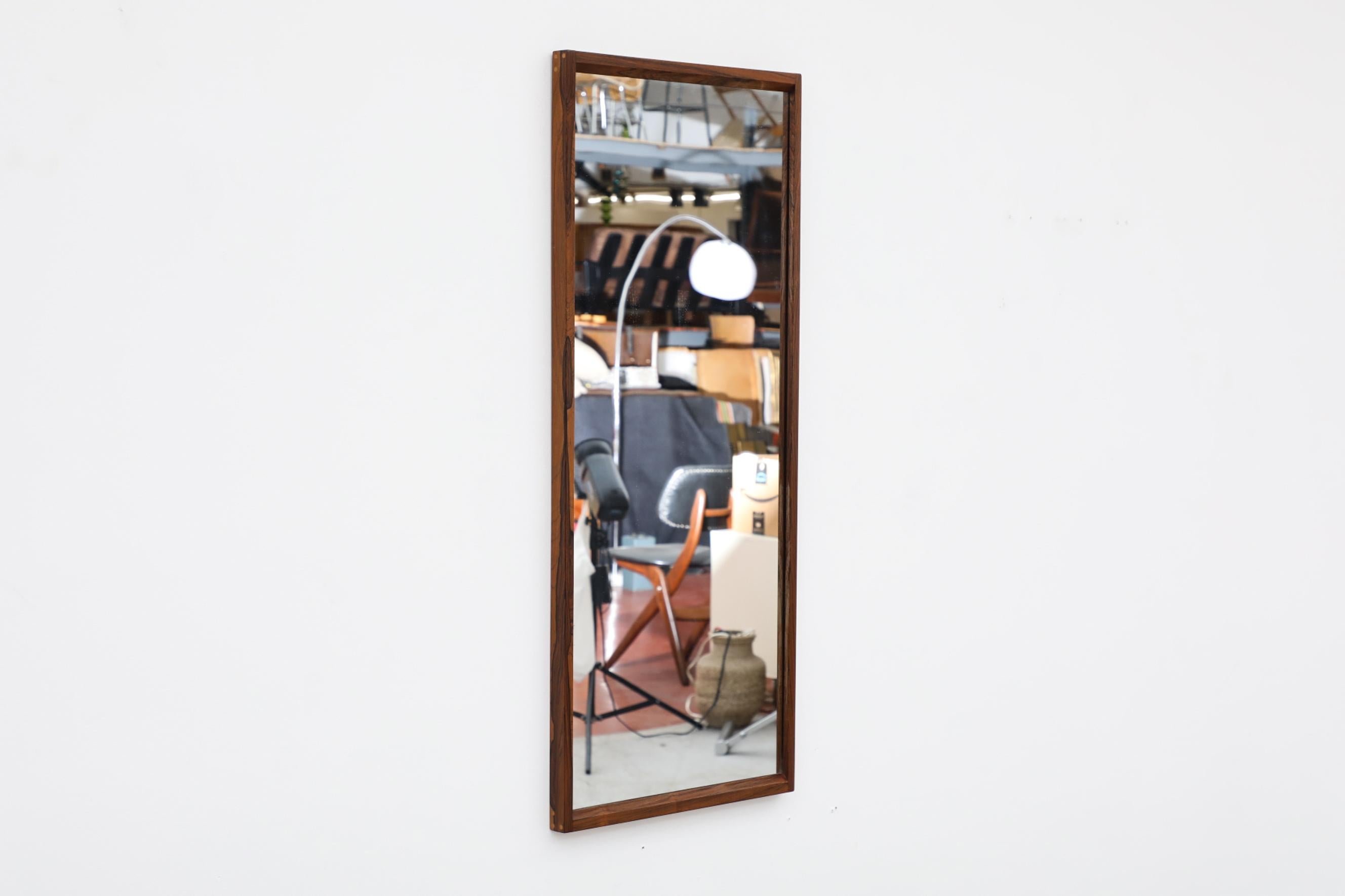 Midcentury Danish Rosewood Wall Mounted Mirror with Peg Detail In Good Condition For Sale In Los Angeles, CA