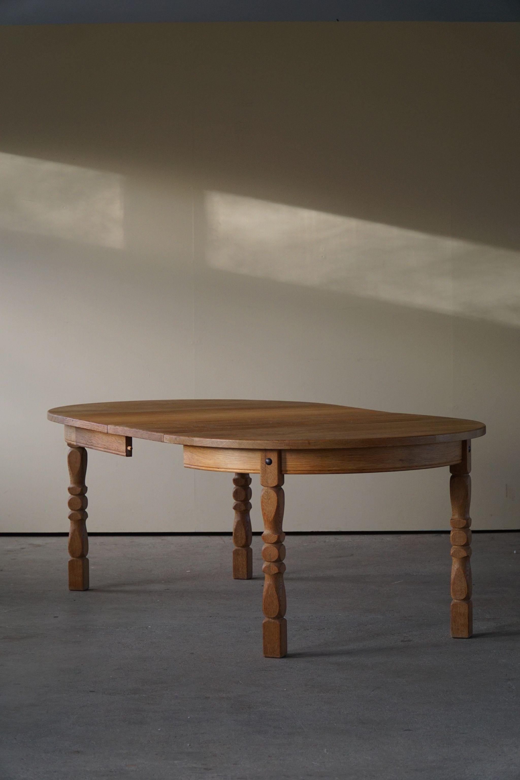 20th Century Mid-Century Danish Round Dining Table in Solid Oak with Two Extensions, 1960s