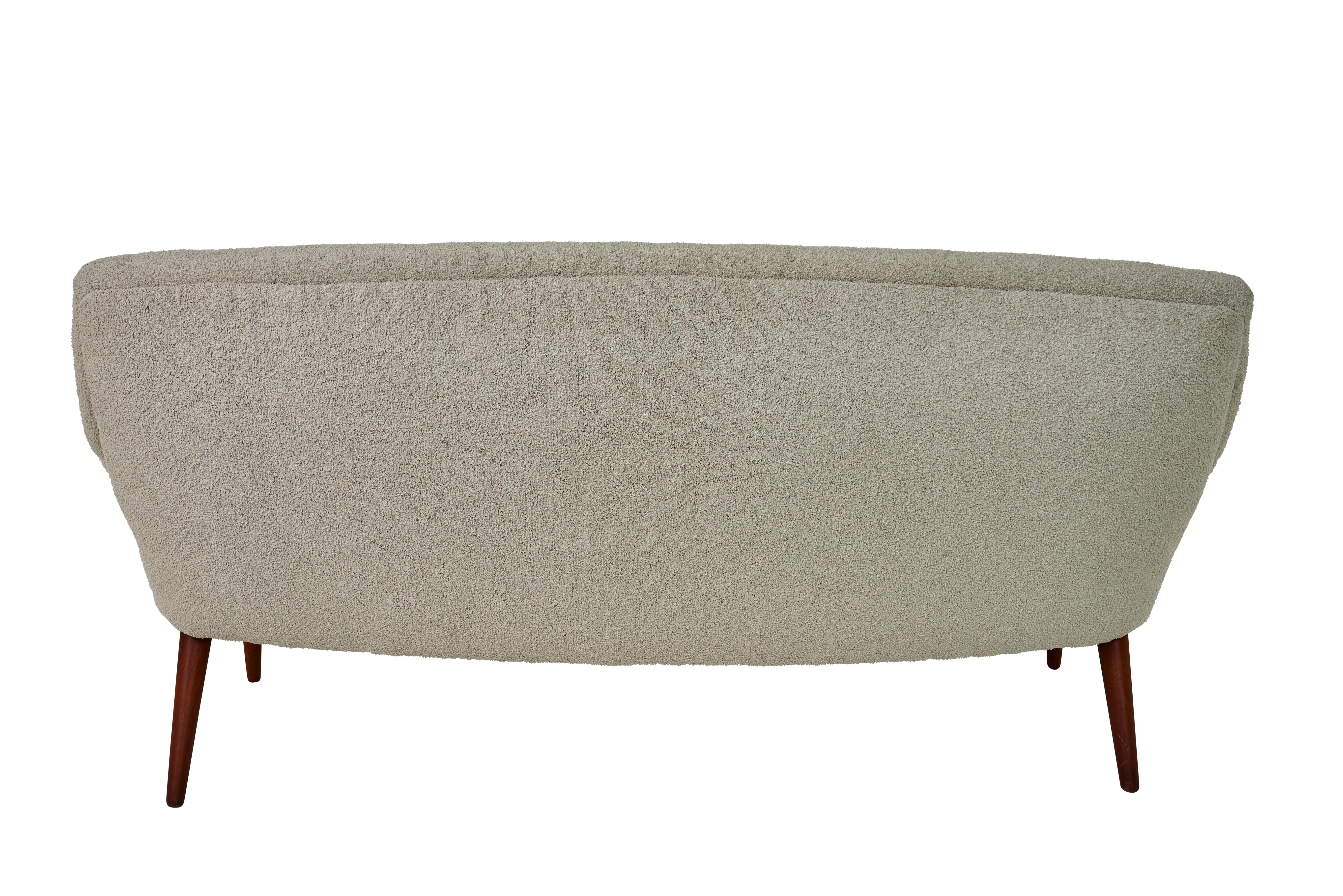 This midcentury Danish settee sits atop four wood legs.

Since Schumacher was founded in 1889, our family-owned company has been synonymous with style, taste, and innovation. A passion for luxury and an unwavering commitment to beauty are woven into