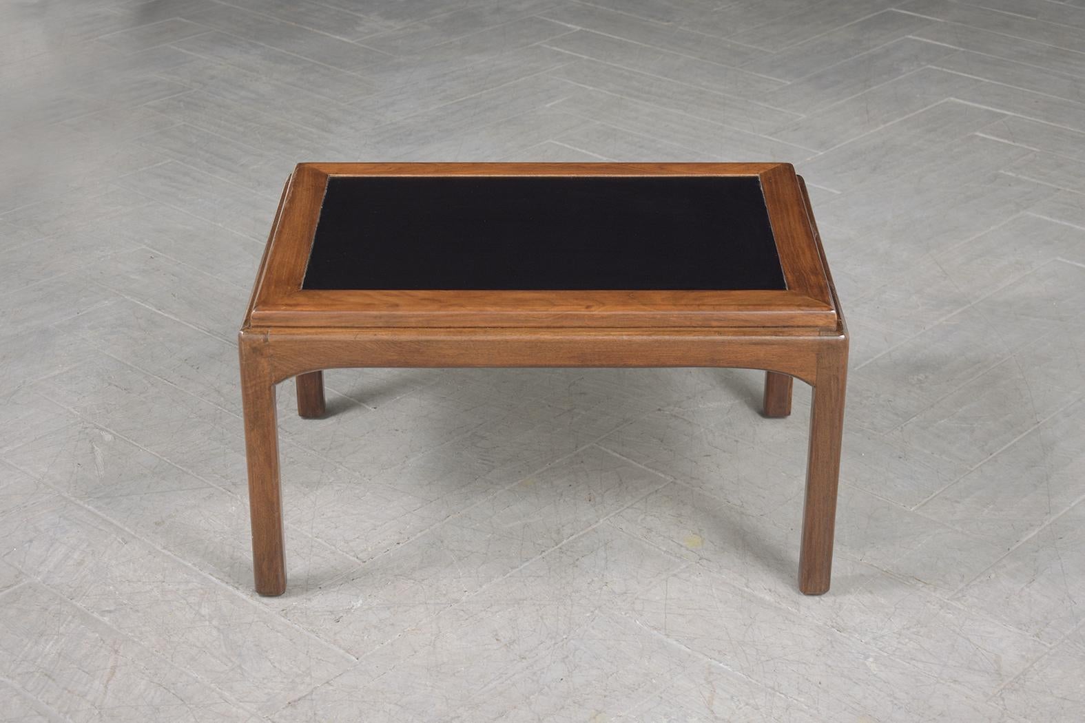 Carved 1960s Restored Mid-Century Modern Walnut Side Table with Black-Laminated Center For Sale