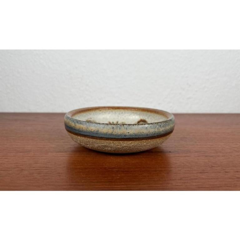 Mid-Century Danish Studio Pottery Bowl from Søholm, 1960s, in Very Good conditions. Designed 1960 to 1969 This piece has an attribution mark.

Additional information:
Materials: Earthenware
Style: Mid-Century Modern
Country of Origin: Denmark
Color: