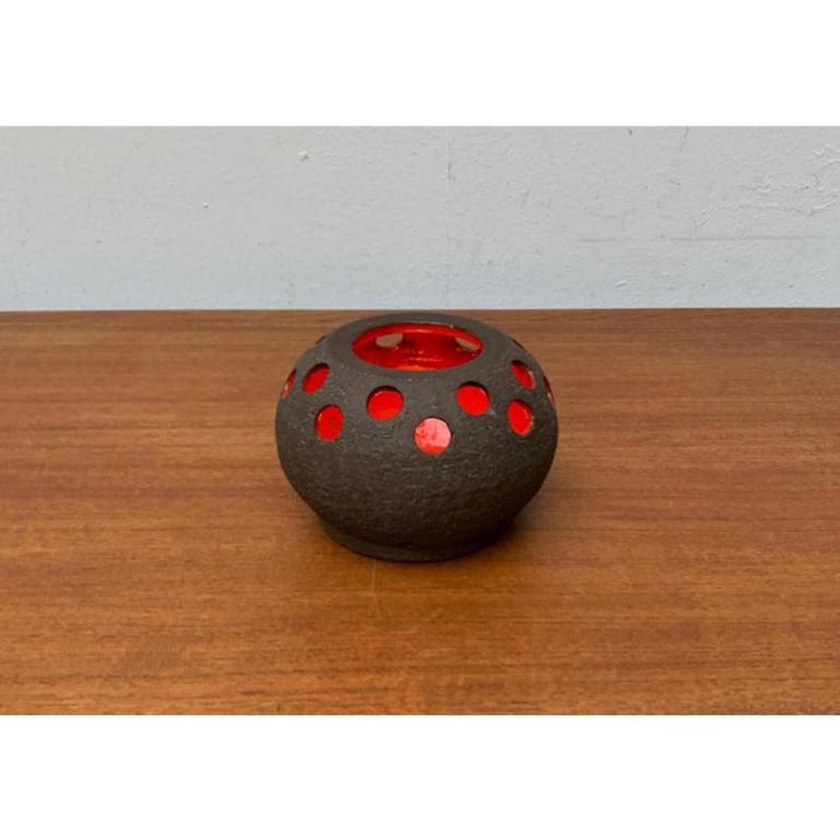 Mid-Century Danish Studio Pottery Candleholder from Lovemose, 1960s, in Very Good conditions. Designed 1960 to 1969 This piece has an attribution mark.

Additional information:
Materials: Ceramic
Style: Mid-Century Modern
Country of Origin: