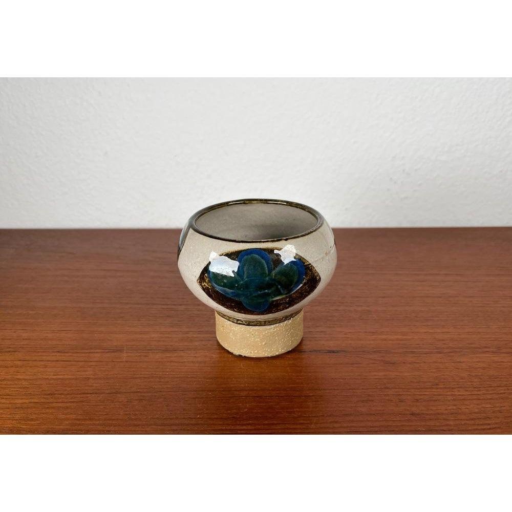 Mid-Century Danish Studio Pottery Candleholder in Stoneware from Søholm, 1960s, in Very Good conditions. Designed 1960 to 1969 This piece has an attribution mark.

Additional information:
Materials: Earthenware
Color: Beige
Styles: Mid-Century