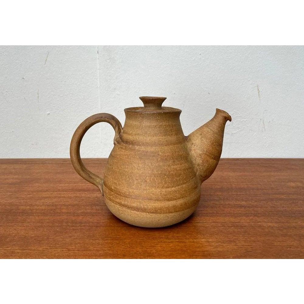 Théière du Studio danois du milieu du siècle, 1976, en très bon état. Conçue de 1970 à 1979

Informations complémentaires :
MATERIAL : Faïence
Couleur : Beige
Styles : Moderne du milieu du siècle
Période : 1970s
Pays d'origine : Danemark
Type