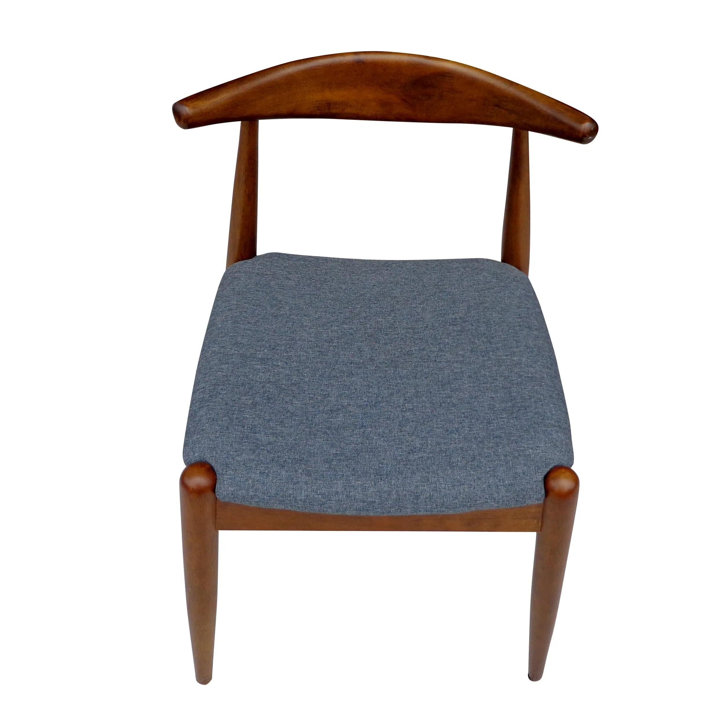 Mid-century walnut Danish style chair.


Simple and sleek mid century side chair in walnut with grey/blue upholster seat.
 