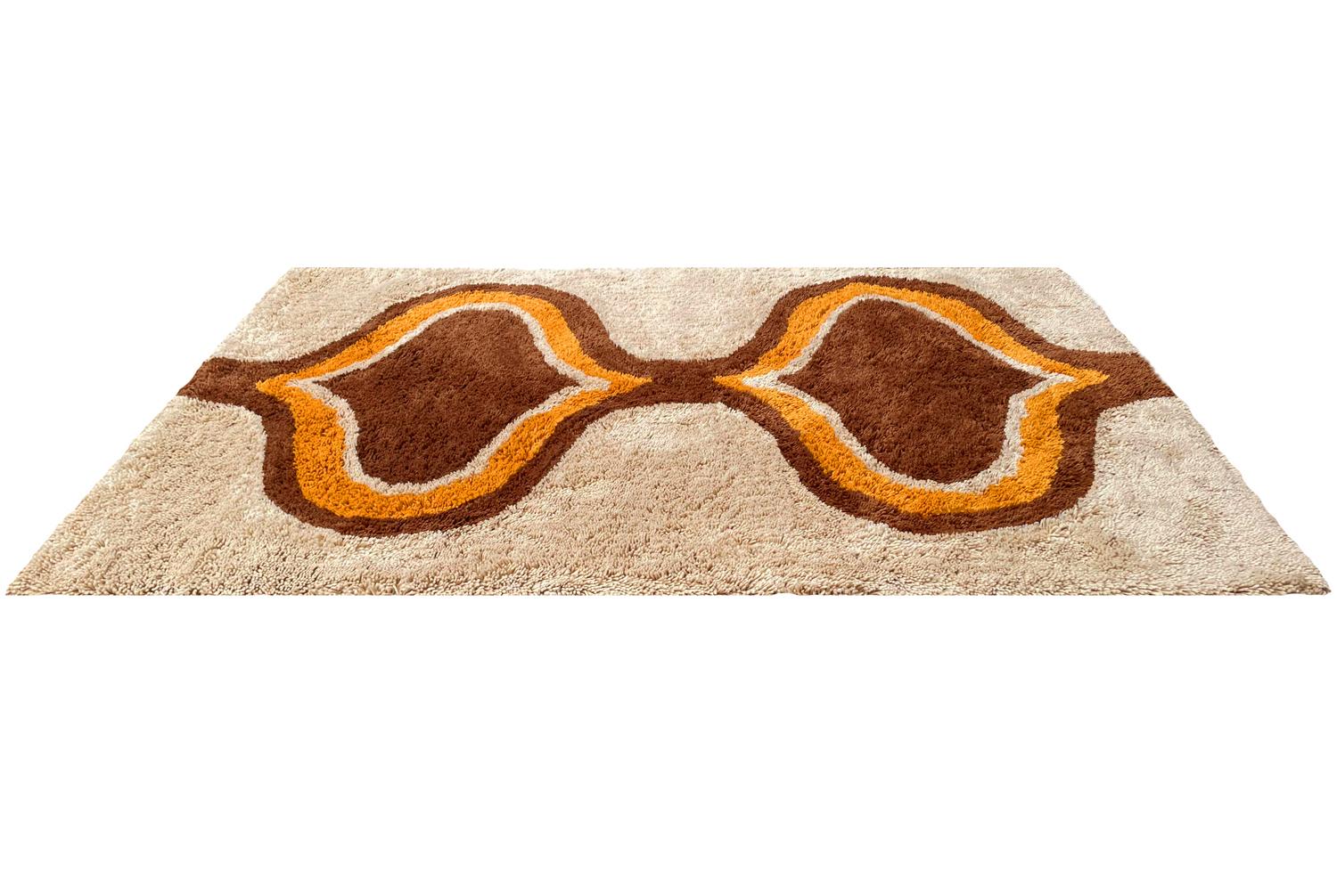 orange and brown shaggy rug