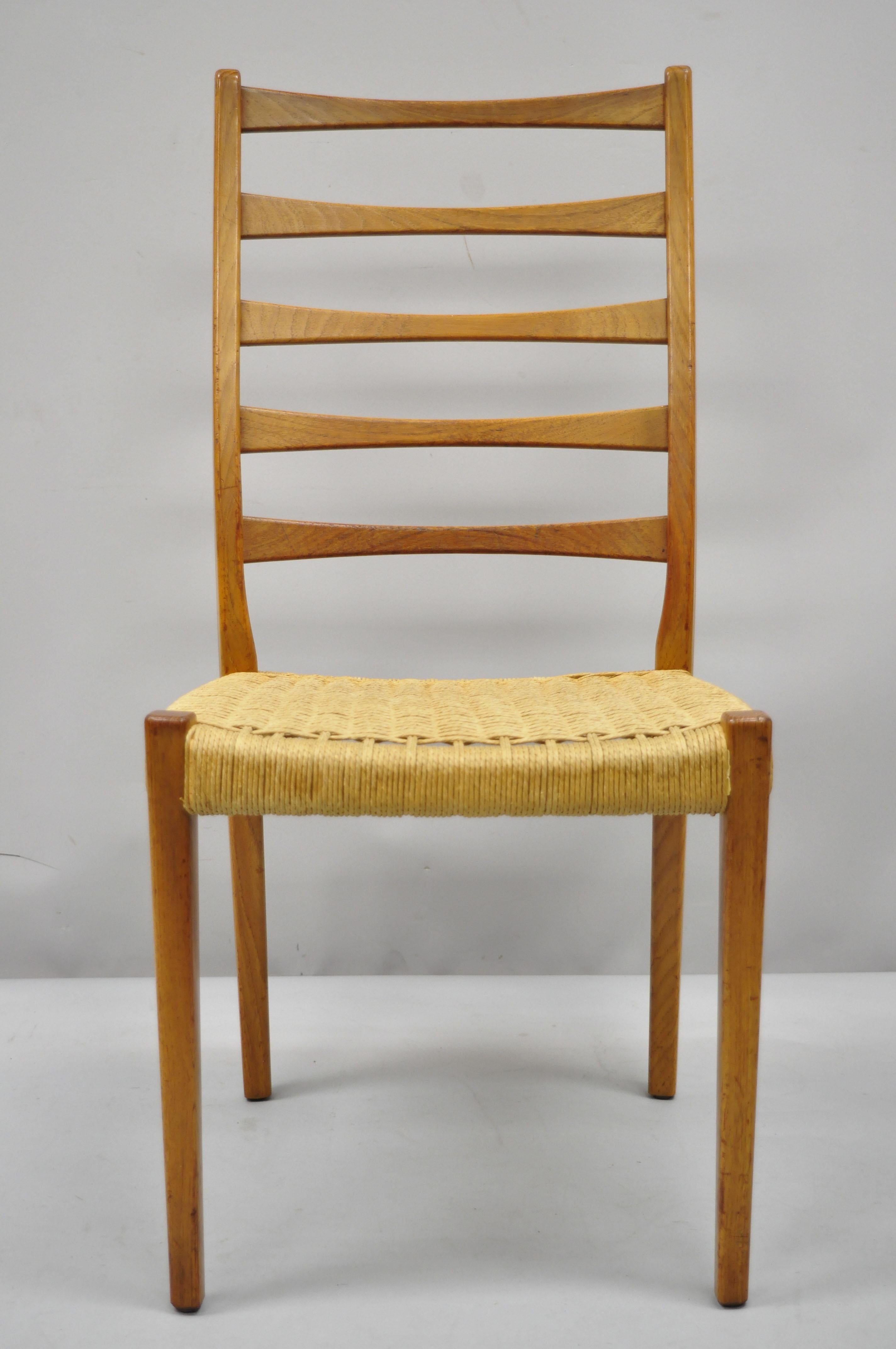 Midcentury Danish Swedish modern Svegards Markaryd teak rope dining chair. Item features woven rope seat, solid wood frame, beautiful wood grain, original stamp, tapered legs, clean modernist lines, quality craftsmanship, circa mid-20th century.