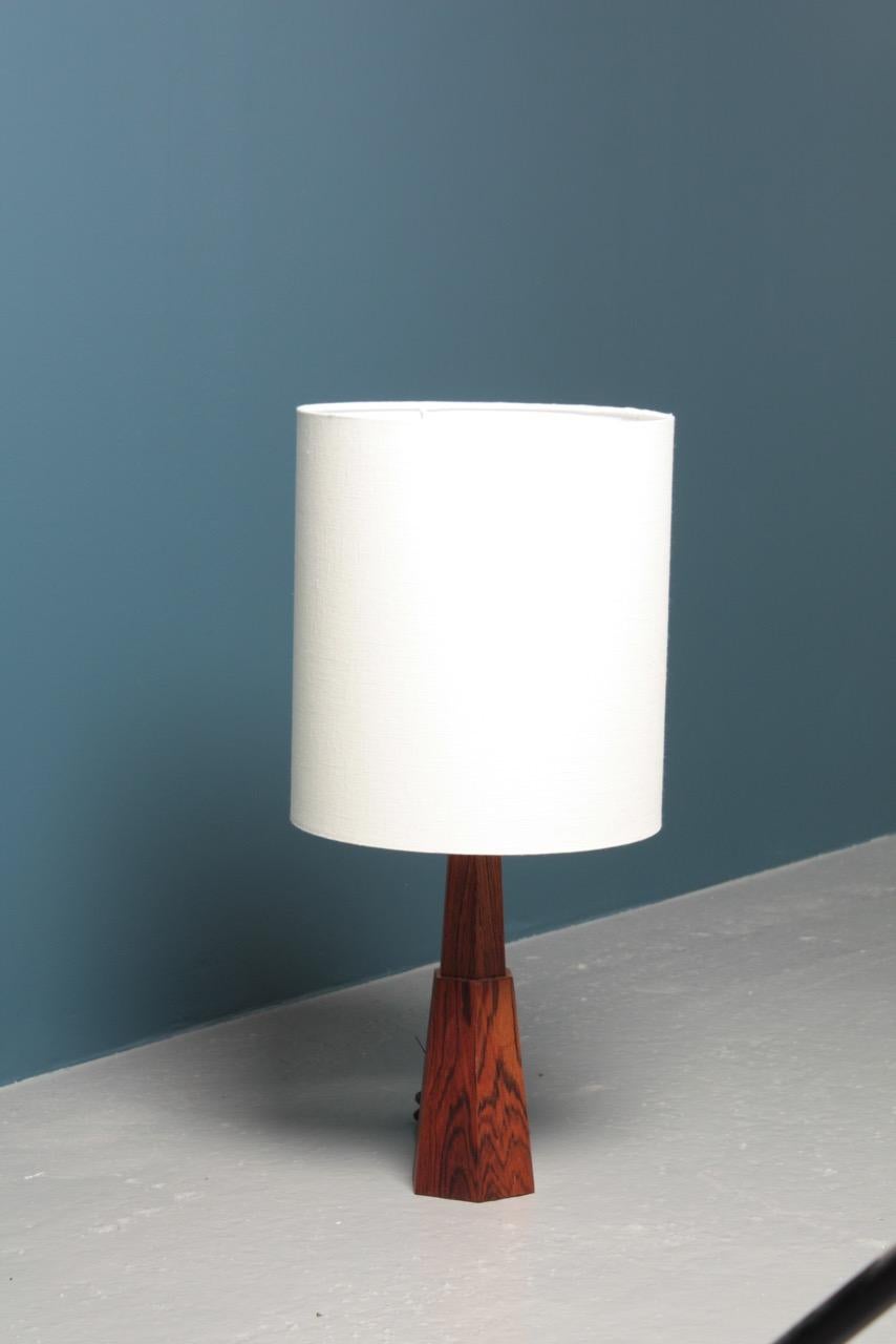 Decorative table lamp in rosewood designed and made in Denmark. Great original condition.