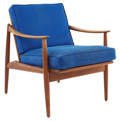 Mid Century Danish Teak and Cane Lounge Chair