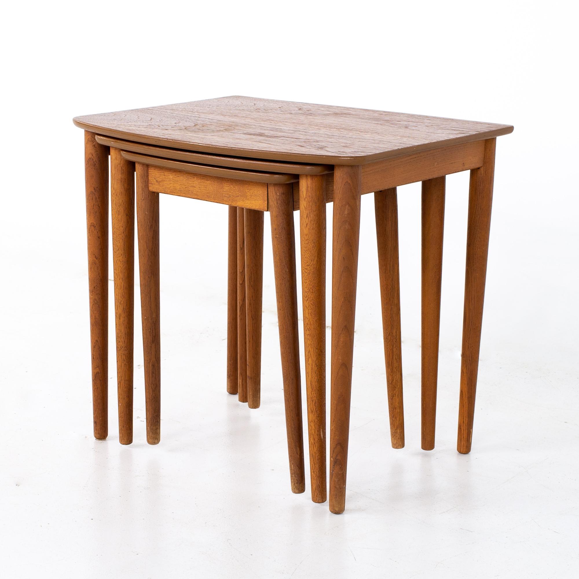 Mid century Danish teak bow front nesting tables
Largest table measures: 20.5 wide x 16 deep x 19 inches high
Middle table measures: 16 wide x 14 deep x 18 inches high
Small table measures: 12 wide x 12 deep x 17 inches high

All pieces of