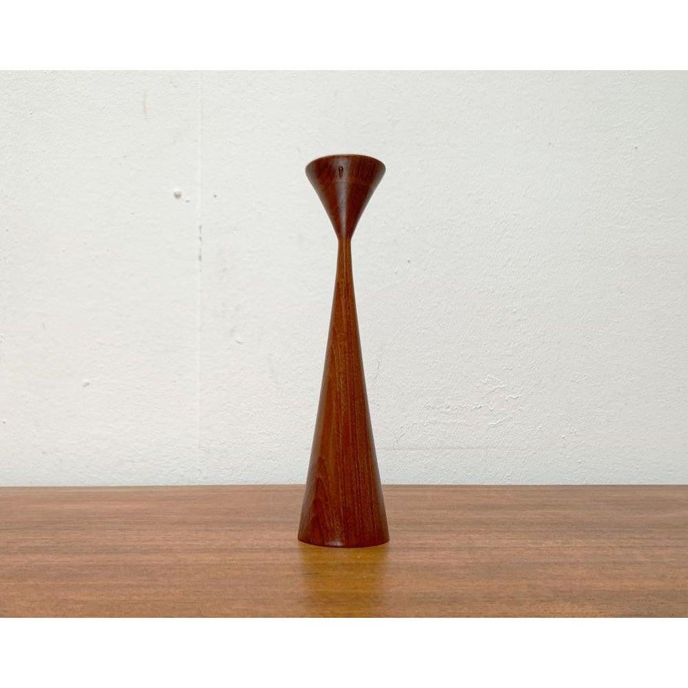Mid-Century Danish Teak Candleholder, 1960s, in Very Good conditions. Designed 1960 to 1969.

Additional information:
Materials: Brass, Teak
Style: Mid-Century Modern
Country of Origin: Denmark
Color: Brown
Item Type: Vintage, Antique or