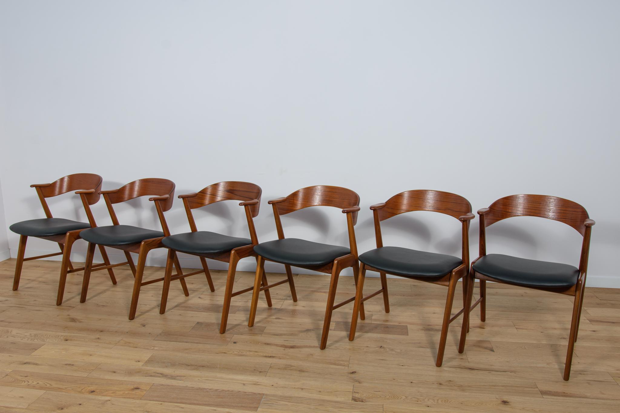 Set of six dining chairs produced by Korup Stolefabrik in the Denmark circa 1960. Elegant chairs with an interesting form. The teak has been cleaned from the old surface and finished with Danish Oil. Upholstery interiors replaced. Upholstered with