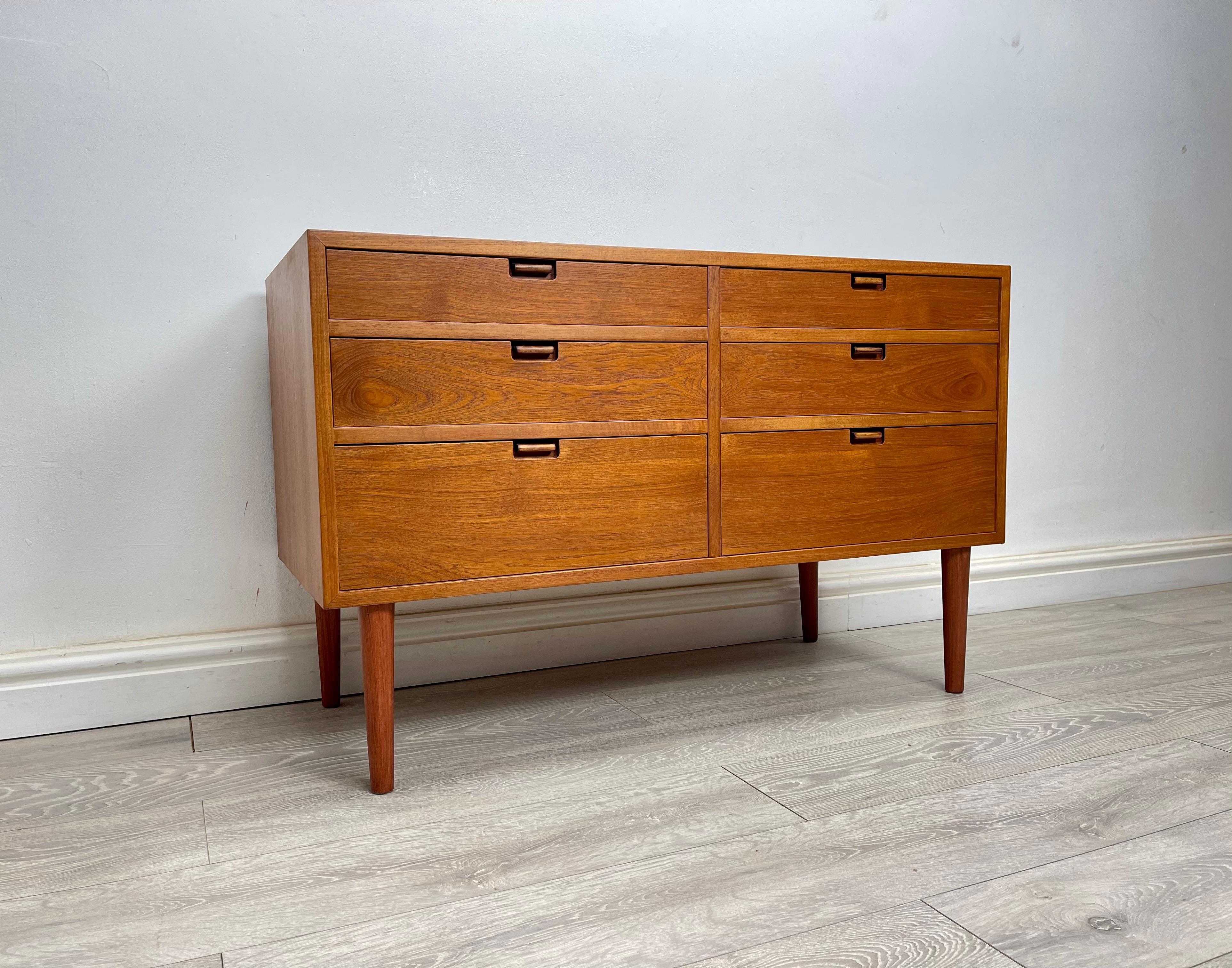 Chest of drawers 
Stunning Midcentury Danish teak double chest of drawers made by Sejling Skabe circa 1970s. 

The chest of drawers stands on round tapered legs has stunning grain and golden patina throughout . 

There’s six drawers with