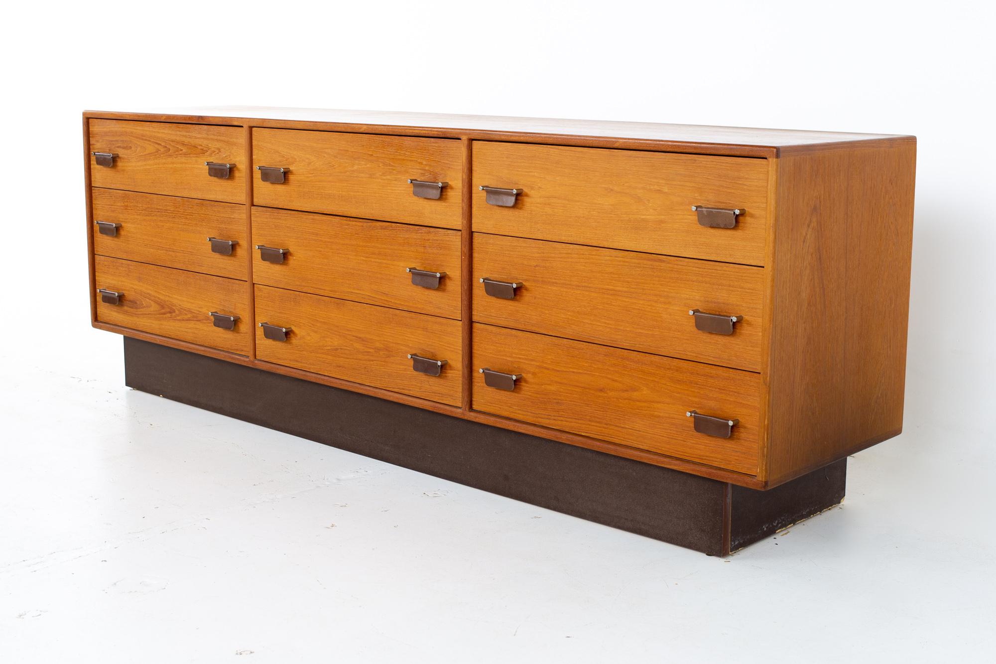 Mid century Danish teak, chrome, and leather 9 drawer lowboy dresser
Dresser measures: 75.5 wide x 18 deep x 26.5 inches high

All pieces of furniture can be had in what we call restored vintage condition. That means the piece is restored upon