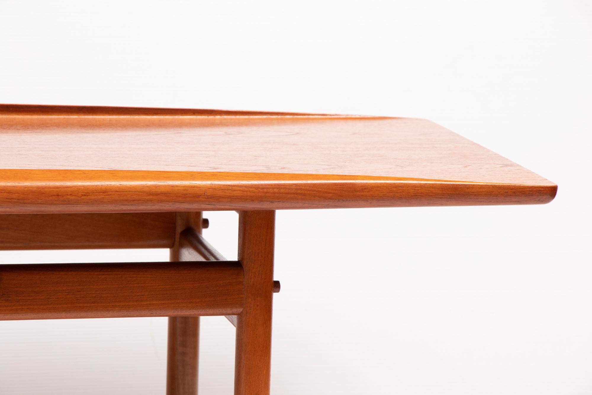Danish teak coffee table by Grete Jalk for Poul Jeppesen, circa 1960. Often called 'The Surfboard Table' it has organic sculpted edges.