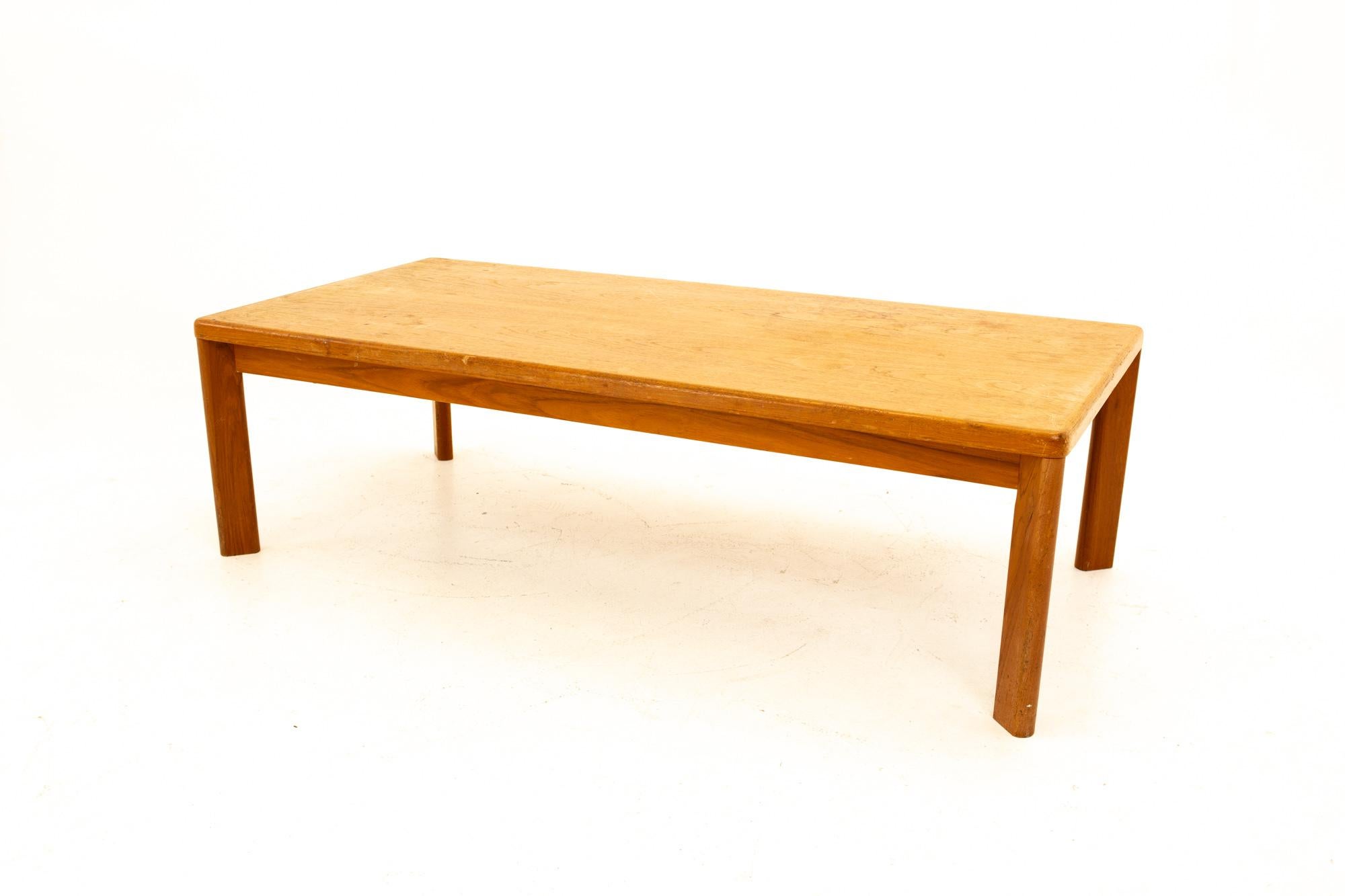 Mid century Danish teak coffee table
Table measures: 53.25 wide x 25.75 deep x 15.75

All pieces of furniture can be had in what we call restored vintage condition. That means the piece is restored upon purchase so it’s free of watermarks, chips