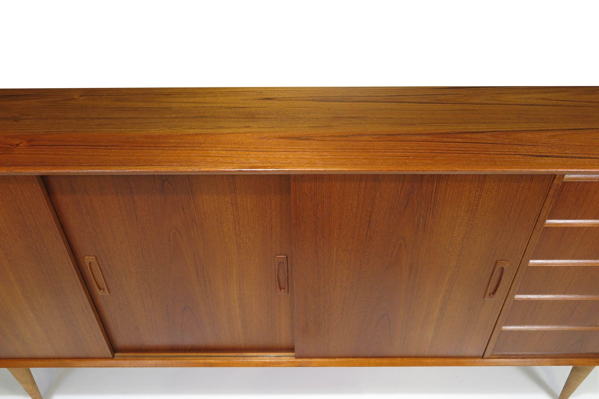 Mid Century Danish Teak Credenza with Sliding Doors & Drawers In Excellent Condition For Sale In Oakland, CA