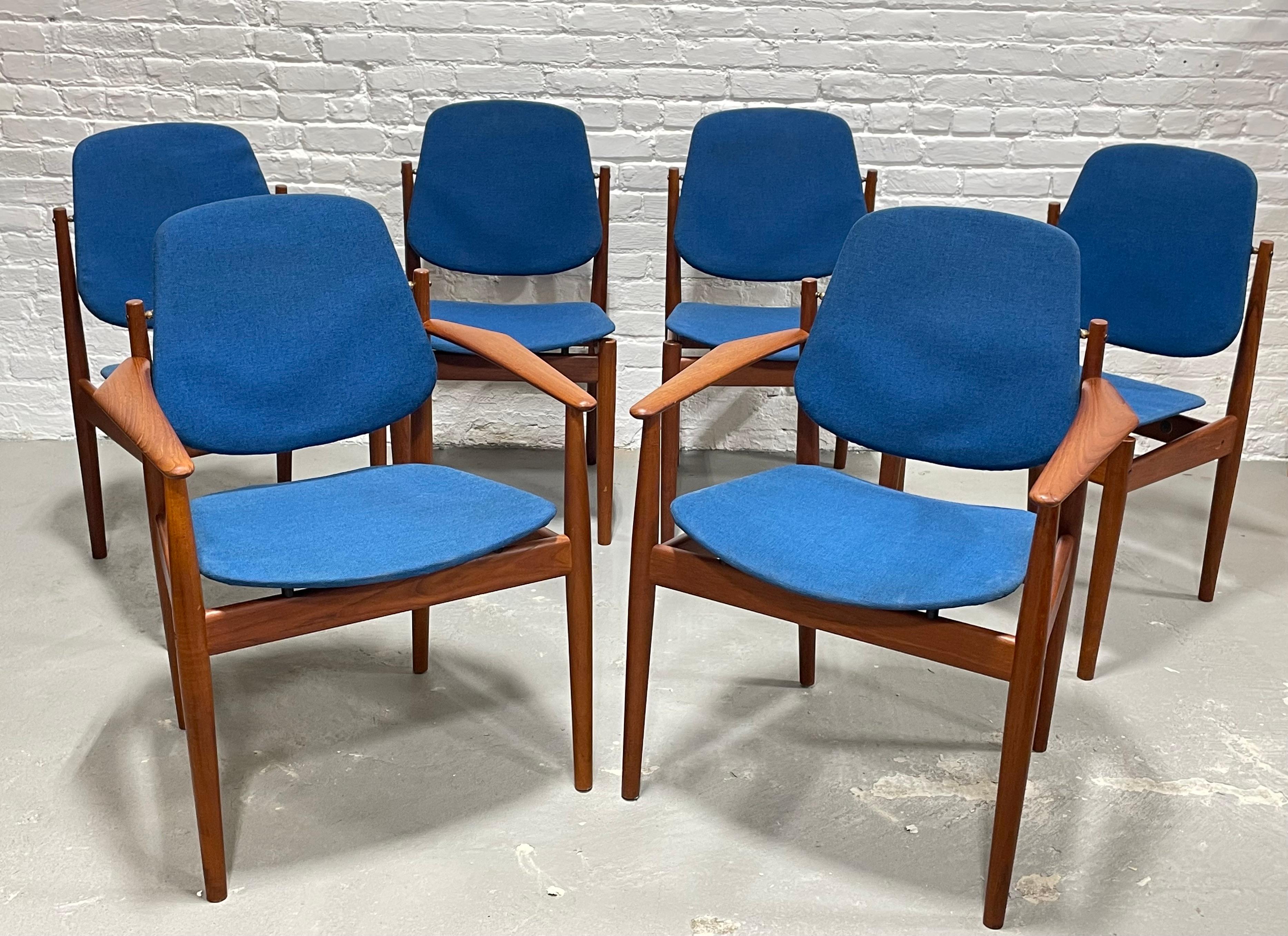 Rare and incredible set of six Mid-Century Modern Danish teak model 203 dining chairs by Arne Vodder for France & Daverkosen. These chairs are showstoppers from every angle. The stunning teak wood features incredible wood grains and are freshly