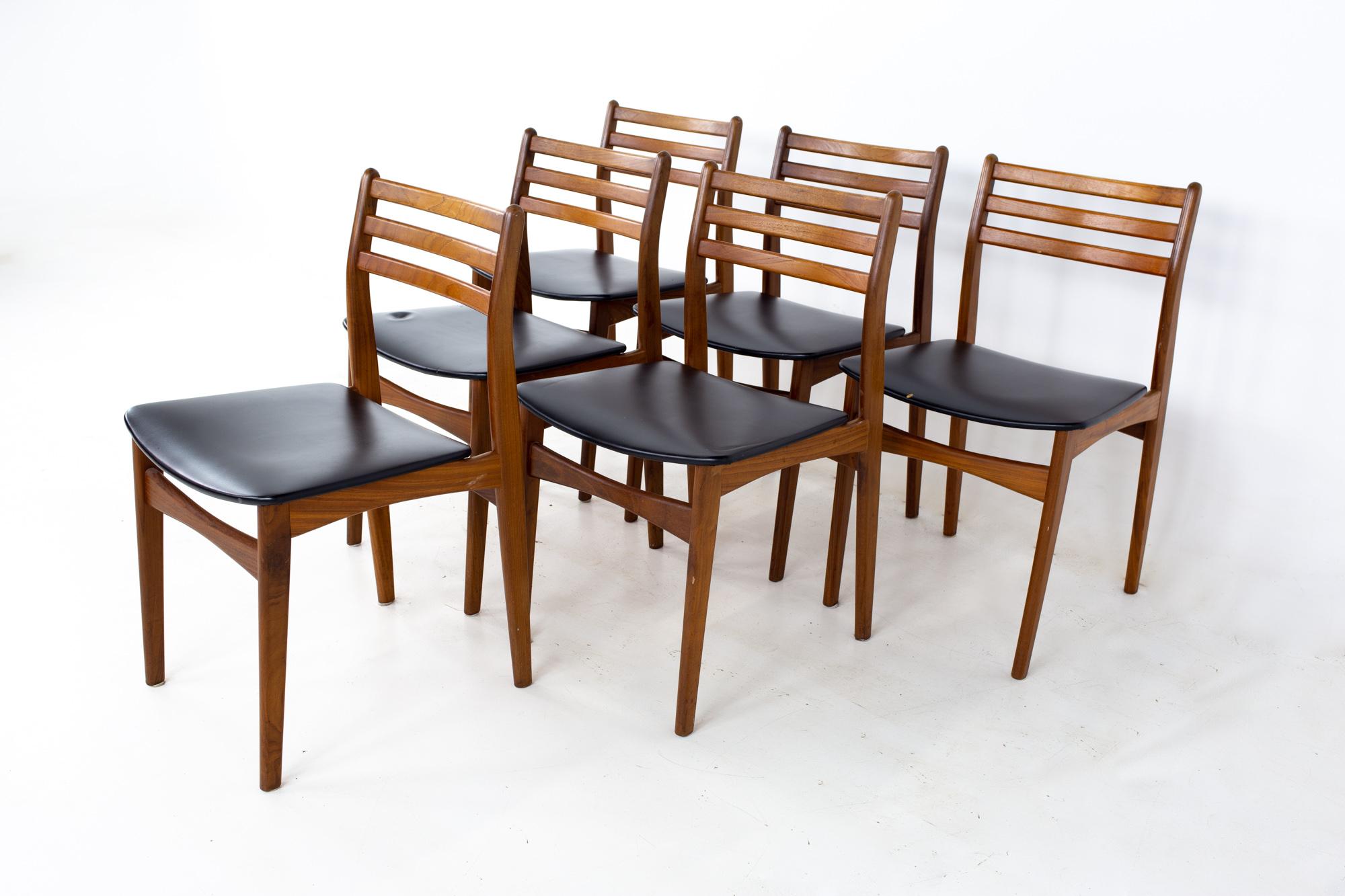Mid century Danish teak dining chairs - Set of 6
Each chair measures: 18.5 wide x 18 deep x 31 high, with a seat height of 17.5 inches

All pieces of furniture can be had in what we call restored vintage condition. That means the piece is