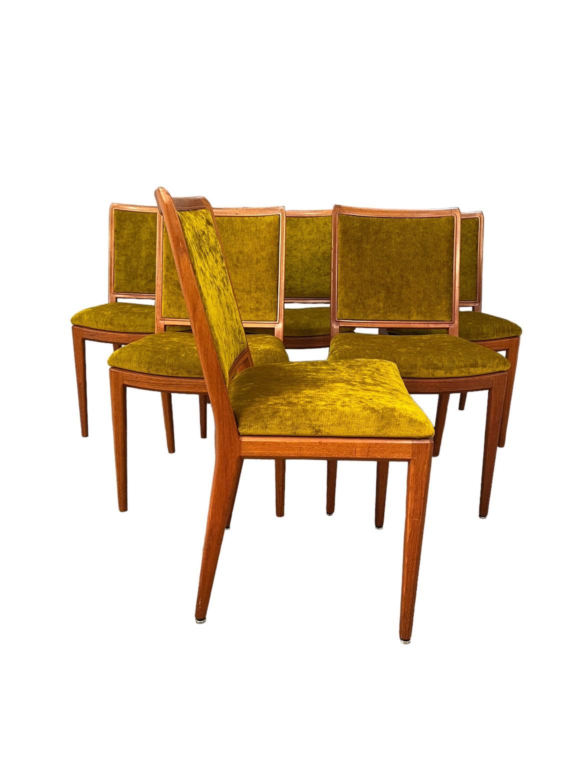 Curated Mid-Century danish teak dining chairs set of 6 1960’s with brand new Upholstery green velvet / gold.
comfy and sturdy like new. 
Dimensions: W19 1/2 X D17 x H34 1/2 inches 
Seat height: 18 inches