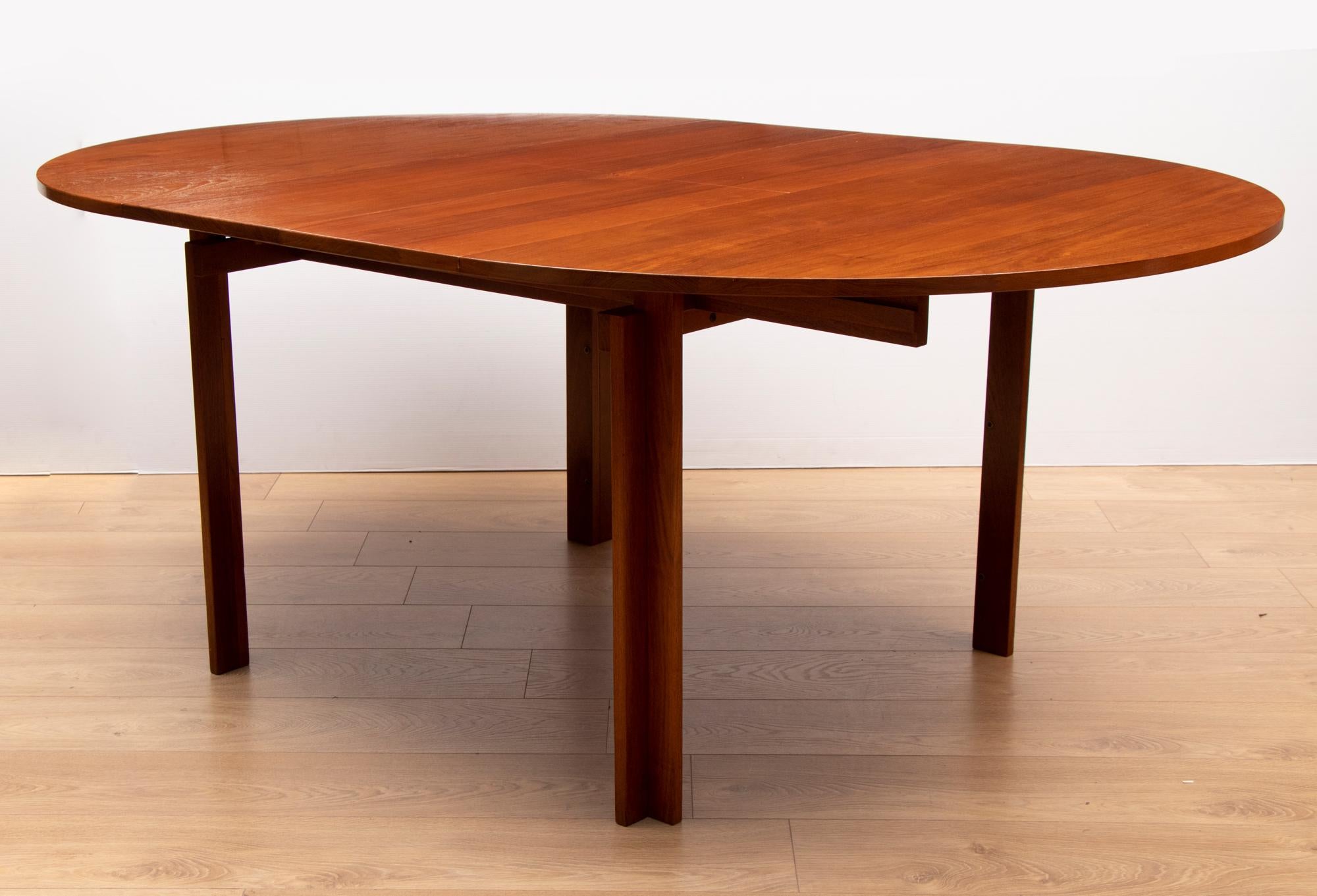 Very rare extending teak dining table by Inger Klingenberg for France and Sons. Produced in the late 1950s-early 1960s.Extends from 119cm round to 119 x 179 cm extended.