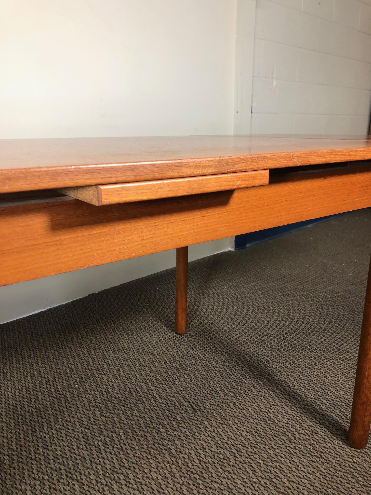Midcentury Danish Teak Draw Leaf Dining Table Seats 8 In Good Condition For Sale In Norcross, GA