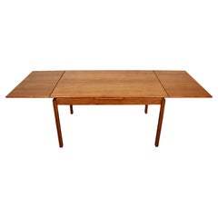 Tavolo danese di metà secolo in teak con ante a strappo