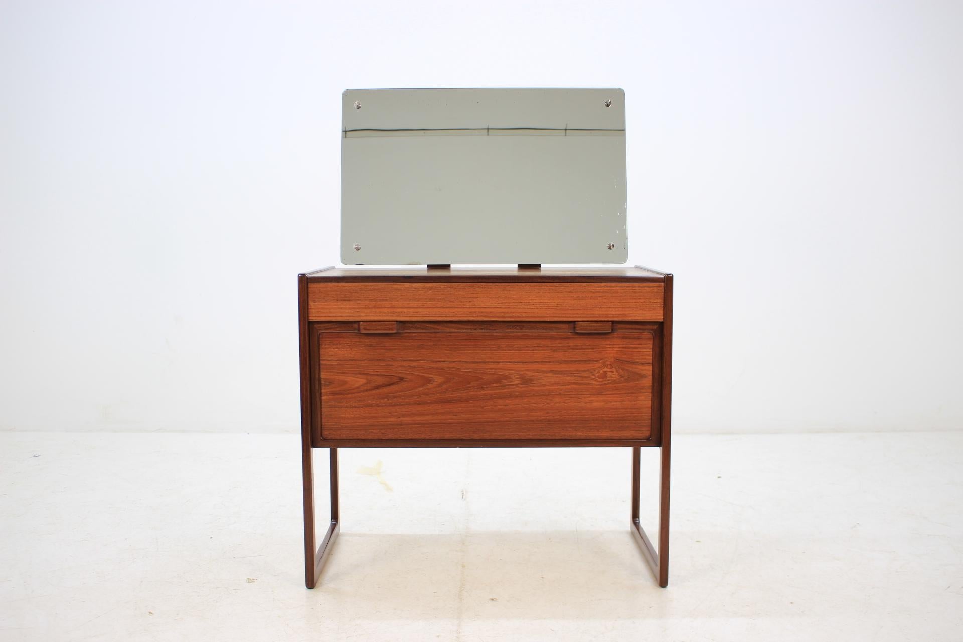 This Danish teak dressing table features the mirror, one drawer and shelve. The height without the mirror 70cm. This item was carefully refurbished.