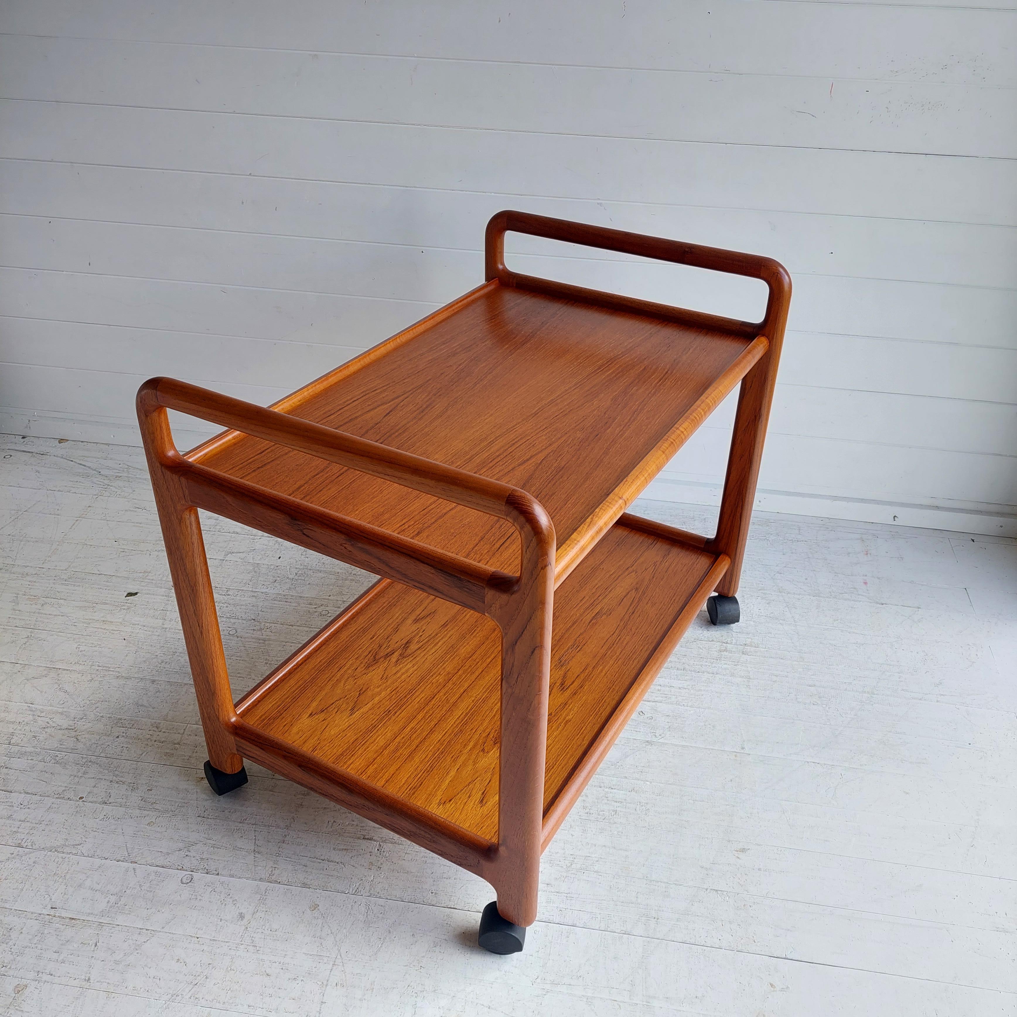 Mid Century Teak sculptural Trolley. Completely restored
Manufactured by KORUP STOLEFABRIK.
Korup Stolefabrik was founded in 1948 and active until 2002.
Designed presumably by Henry Kjaernulf
Made circa 1960 

A great example of European modernist