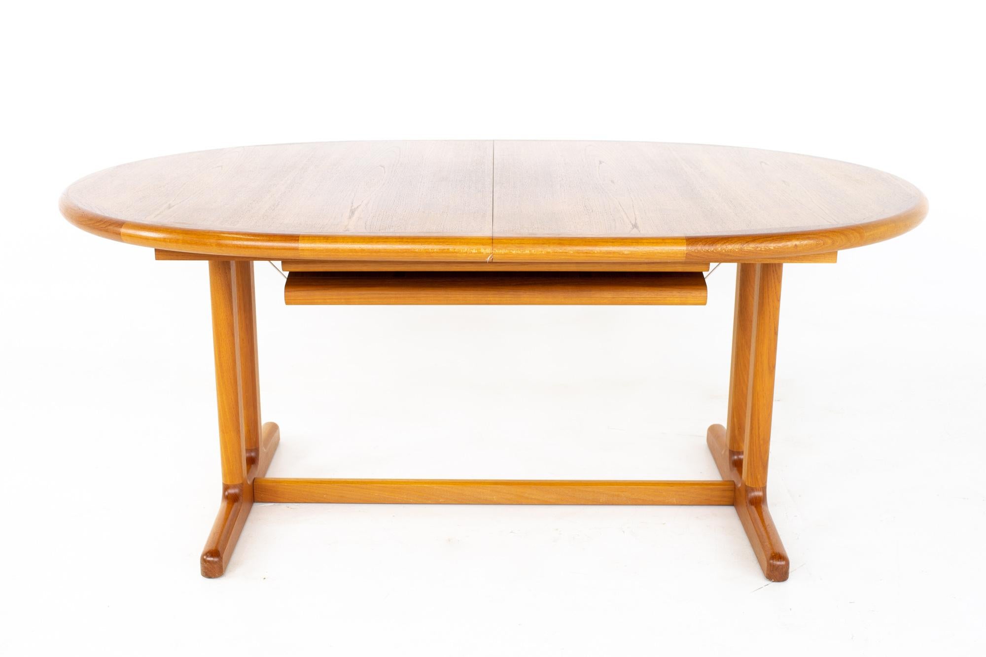 Mid-Century Modern Mid Century Danish Teak Expanding Hidden Leaf Dining Table