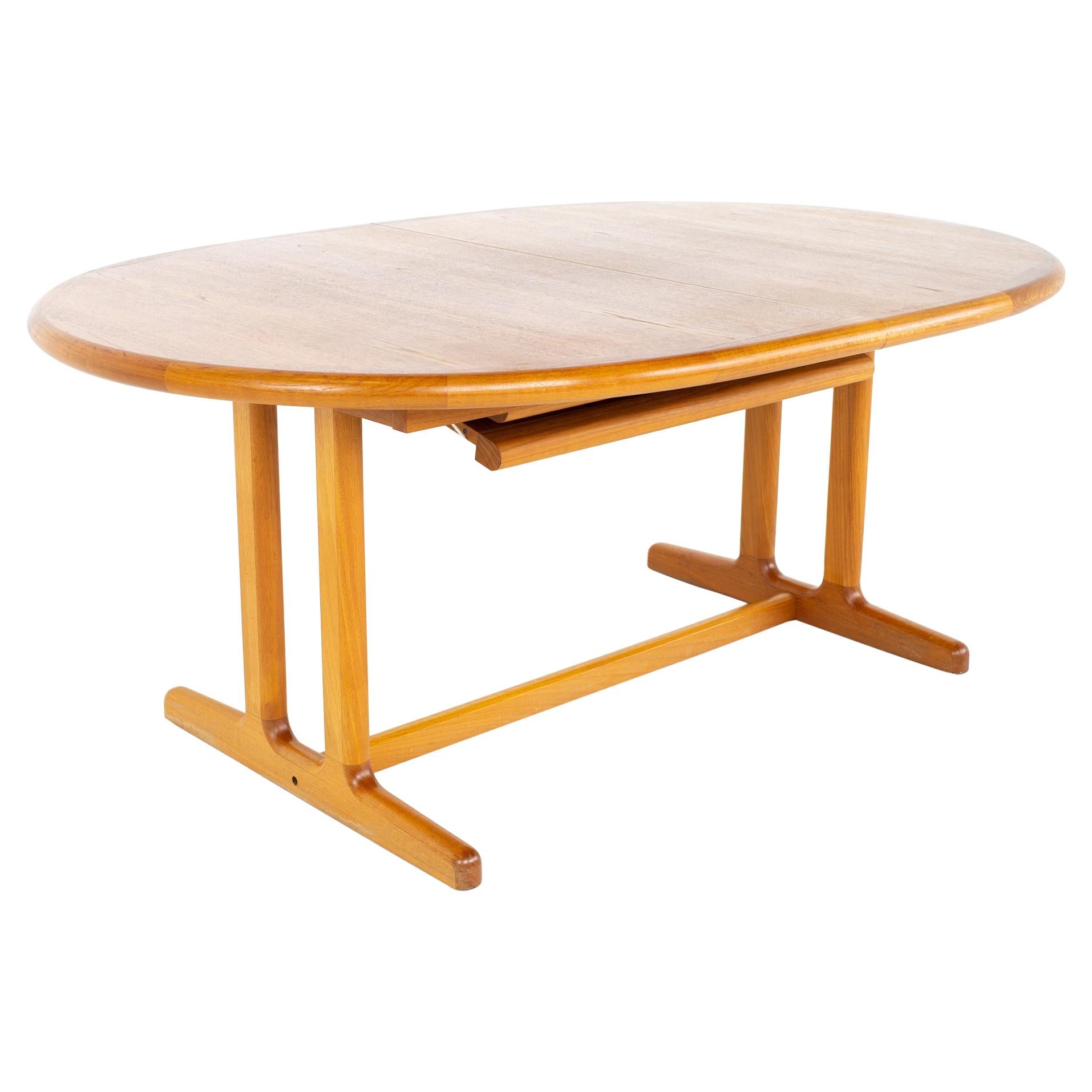 Mid Century Danish Teak Expanding Hidden Leaf Dining Table