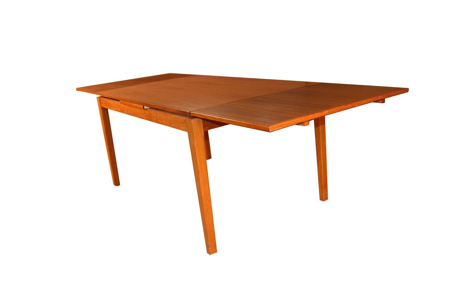 teak dining table extendable
