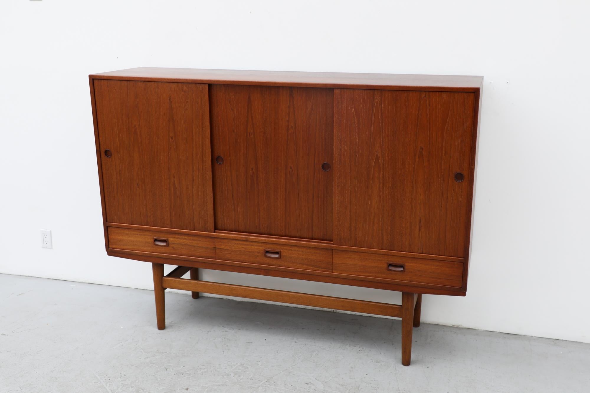 Mid-Century Danish Teak Highboard with Sliding Door Cabinets and Drawers For Sale 2