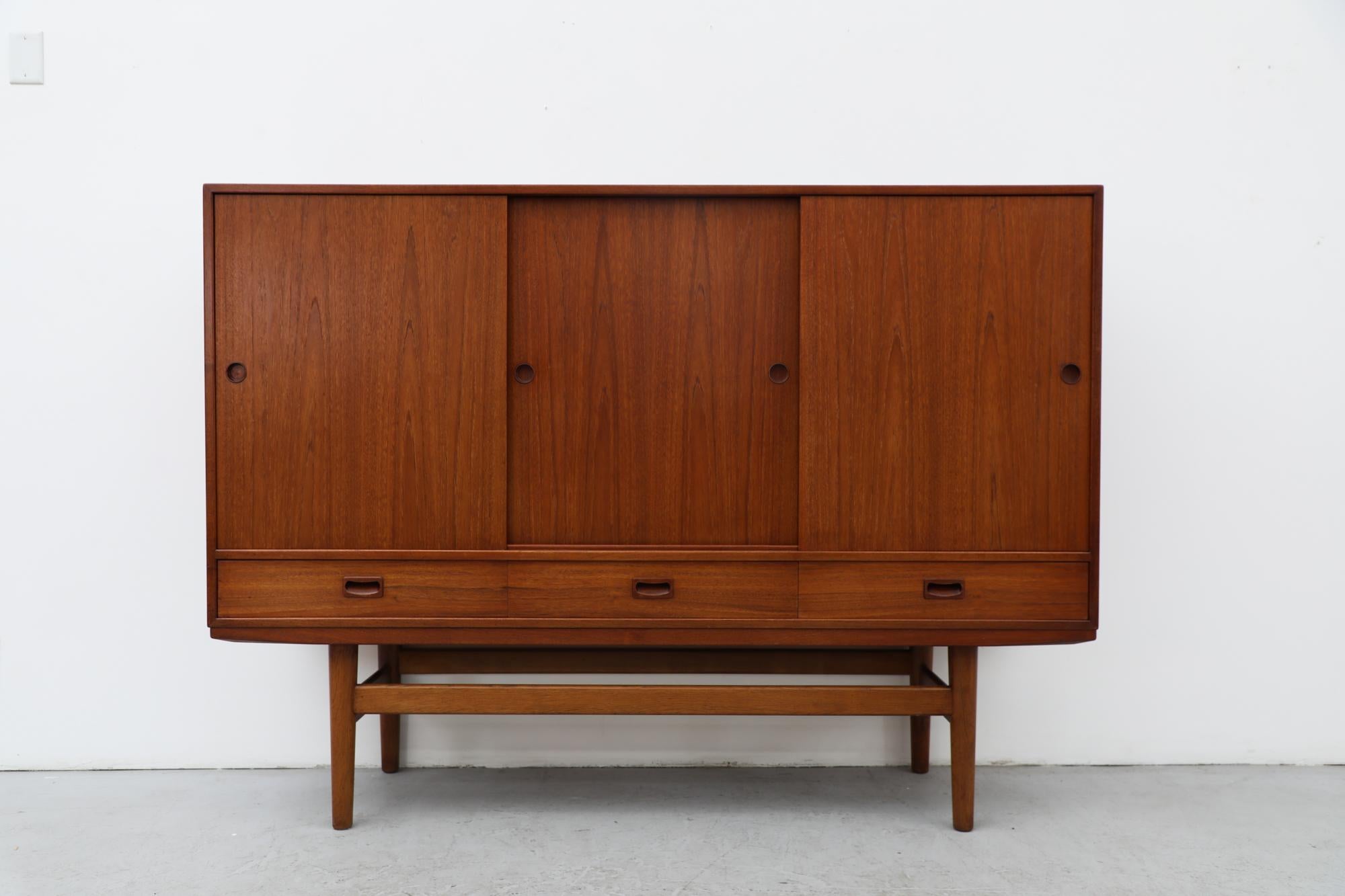 Mid-Century Danish Teak Highboard with Sliding Door Cabinets and Drawers 4
