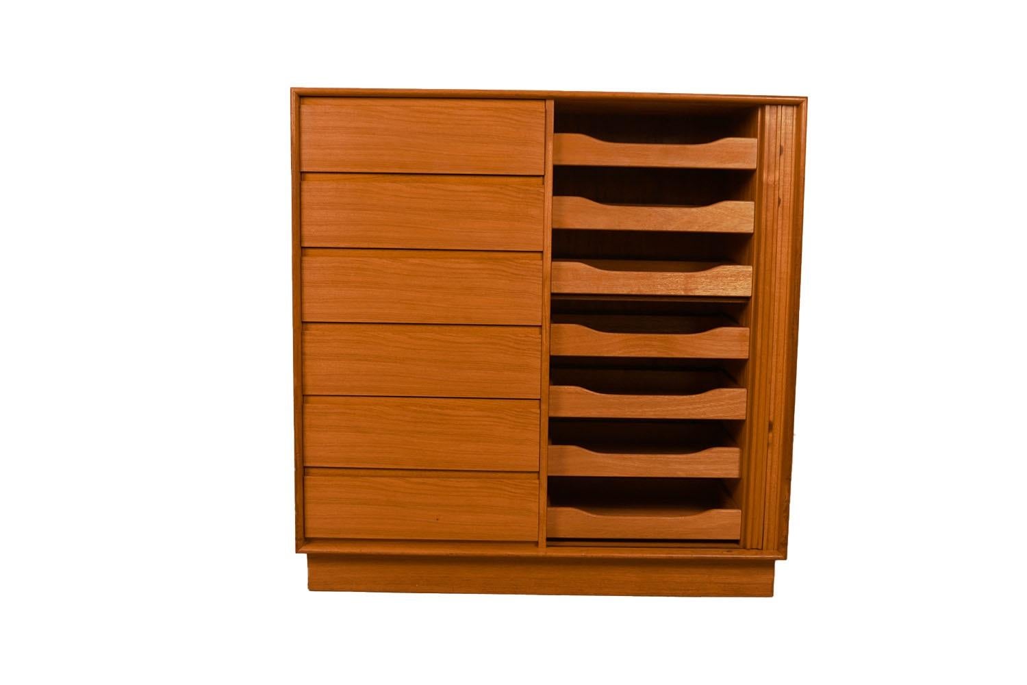 Beautiful mid-century modern highboy, gentleman’s tall tambour dresser, wardrobe, circa 1970’s, by Danflex made in Denmark. Don’t be fooled by the term “Gentleman’s Chest” – this high functioning storage piece is really gender neutral, with plenty