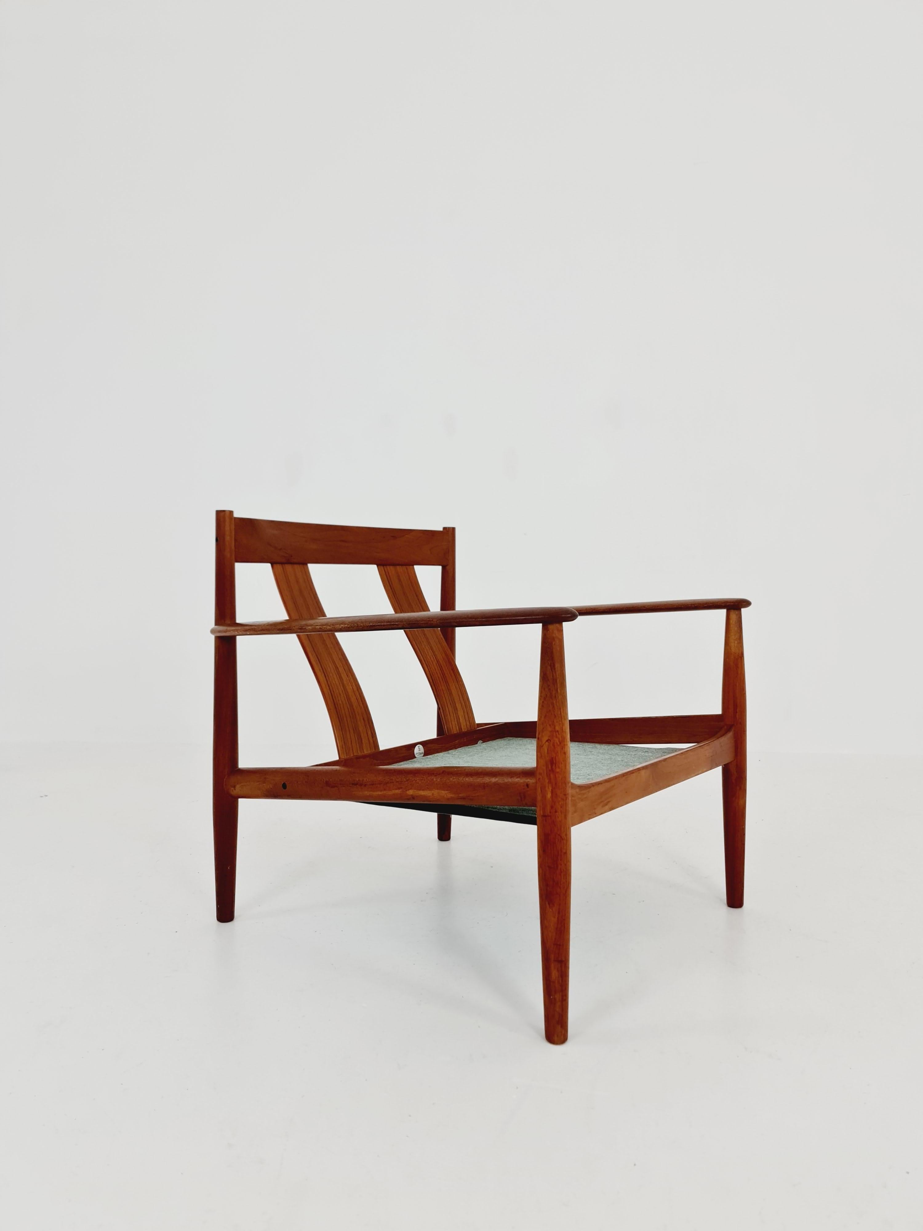 Mid-20th Century Mid-century Danish teak lounge chair/ Easy chair by Grete Jalk For France & Son For Sale