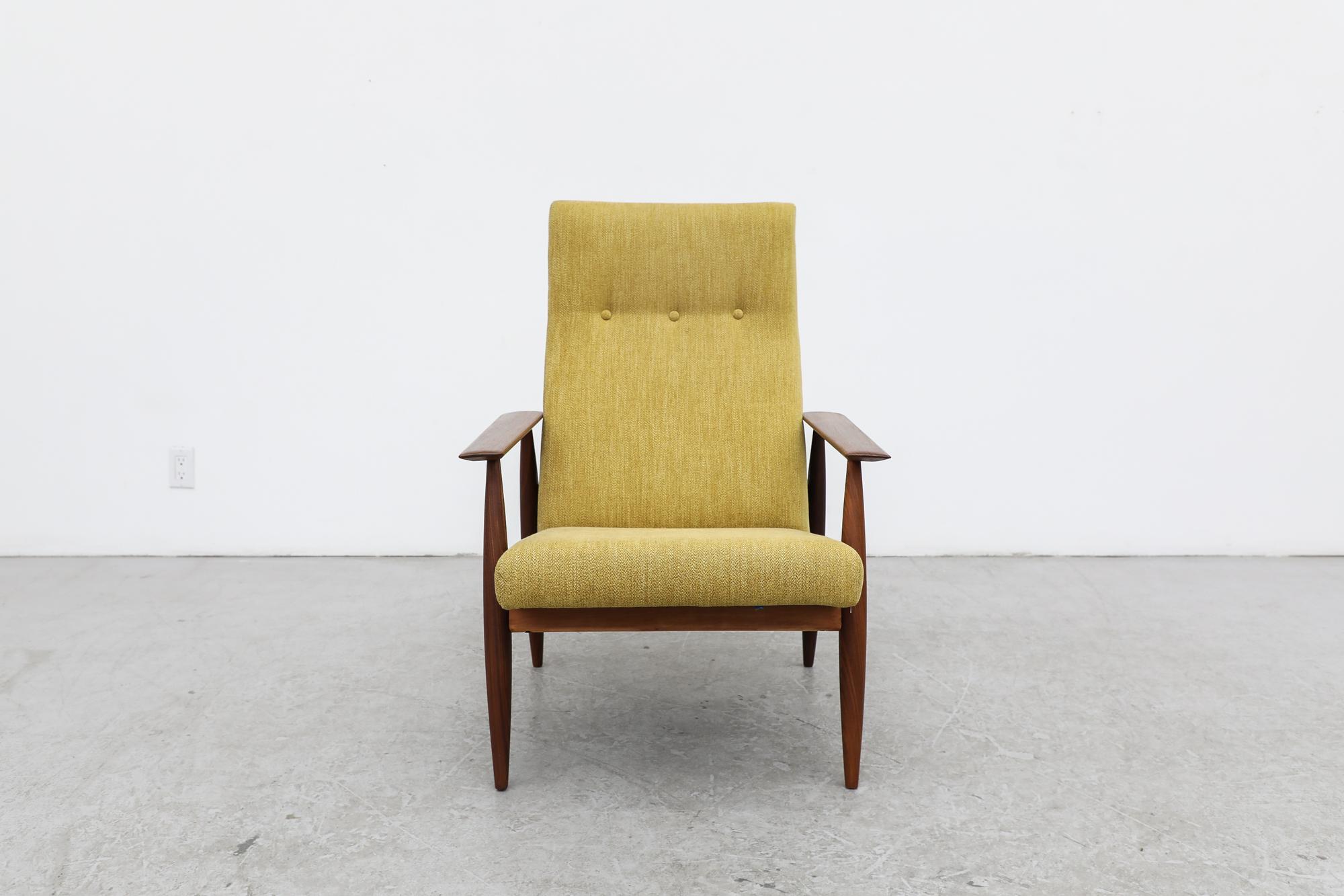 Mid-century Hans Wegner inspired Danish teak lounge chair with newer saffron upholstery. The solid teak frame is in original condition with normal signs of use including some scratches and scuffs. Wear is consistent with its age and use. Another