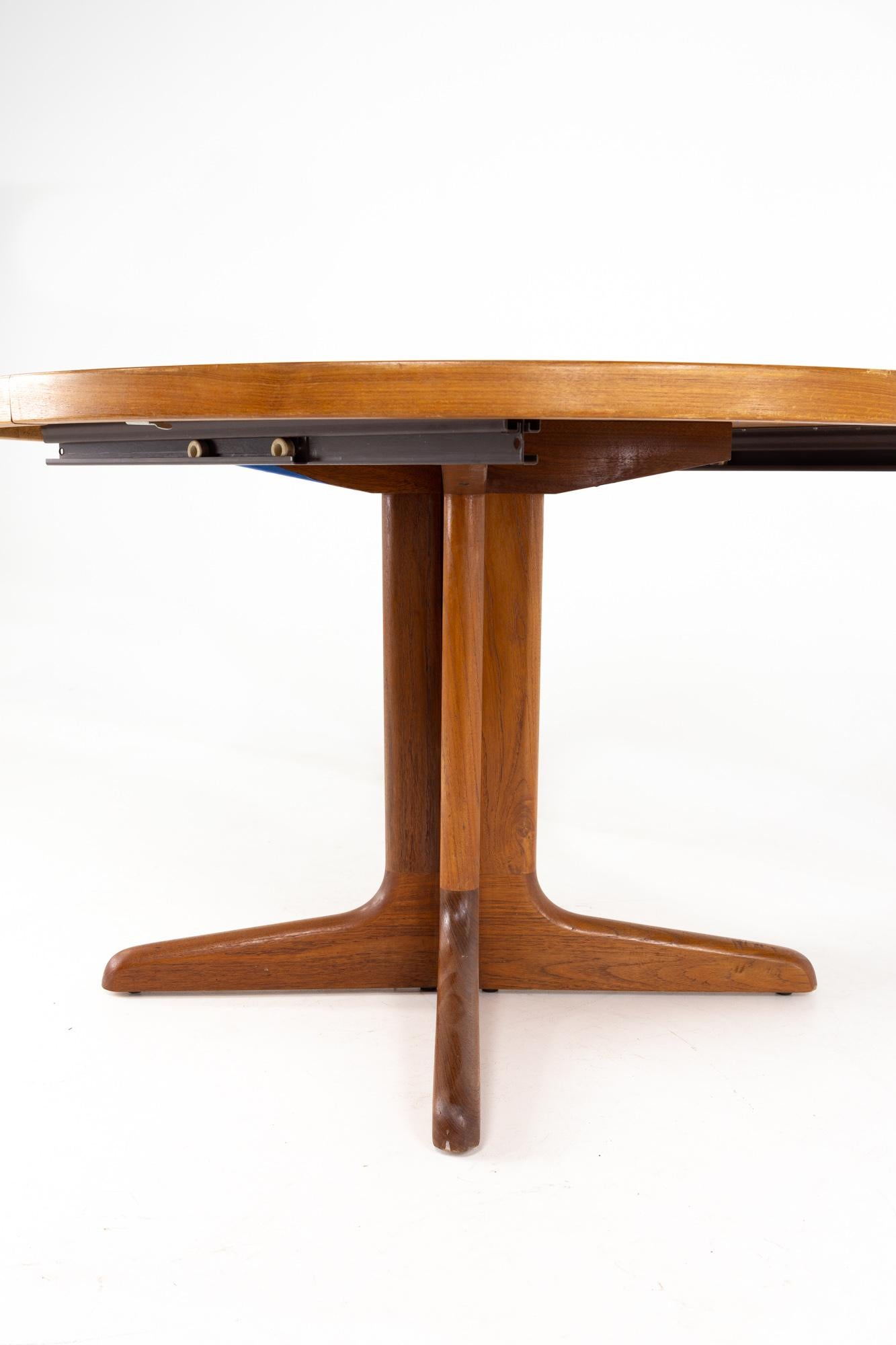 Mid Century Danish Teak Pedestal Base Dining Table with 2 Leaves 10