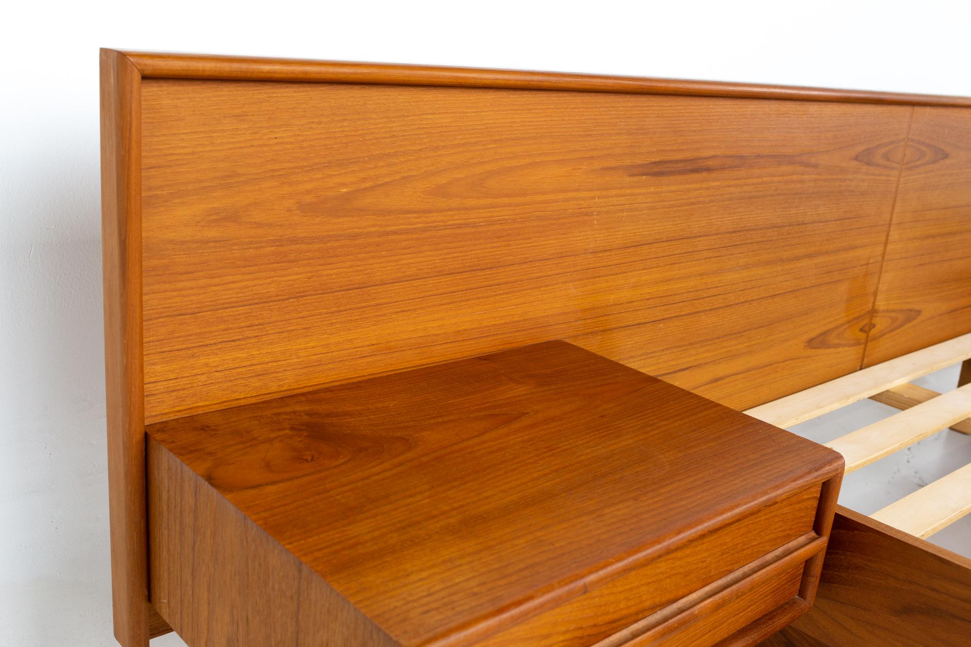 bed with attached nightstands