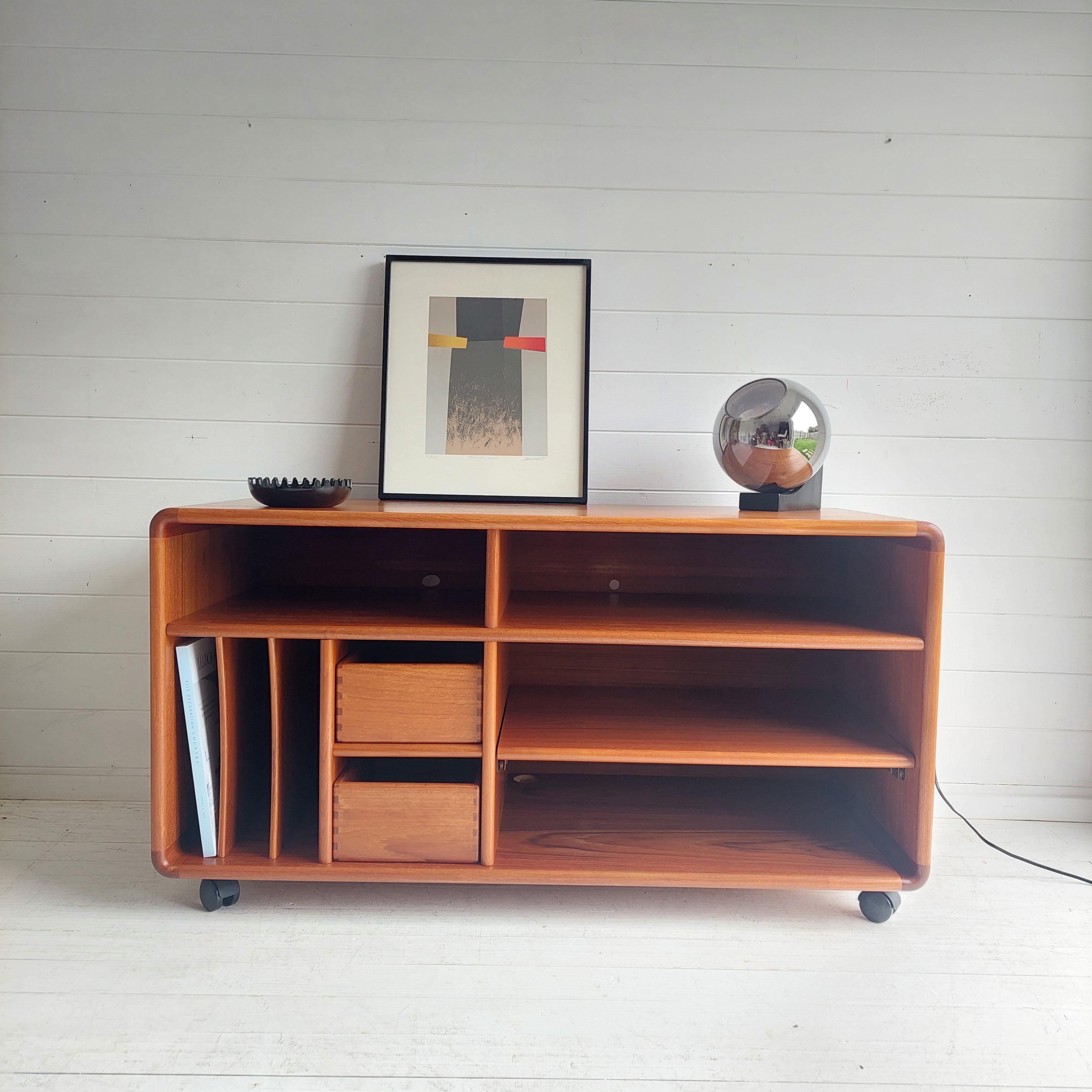 Vintage Danish teak record cabinet sideboard  bySalin Möbler, 1960s
Mobile cabinet in teak, Danish work from the 60s 70s.

Rarely offered, a Danish design teak audio furniture. Manufactured by Salin Mobler in the 1960s. 
The finish of this furniture