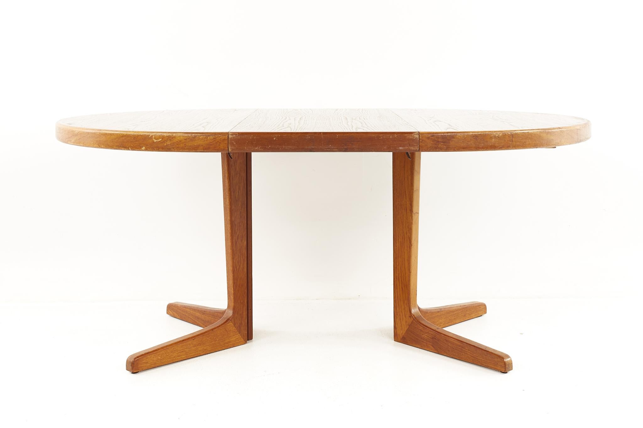 Late 20th Century Mid Century Danish Teak Round Oval Expanding Dining Table