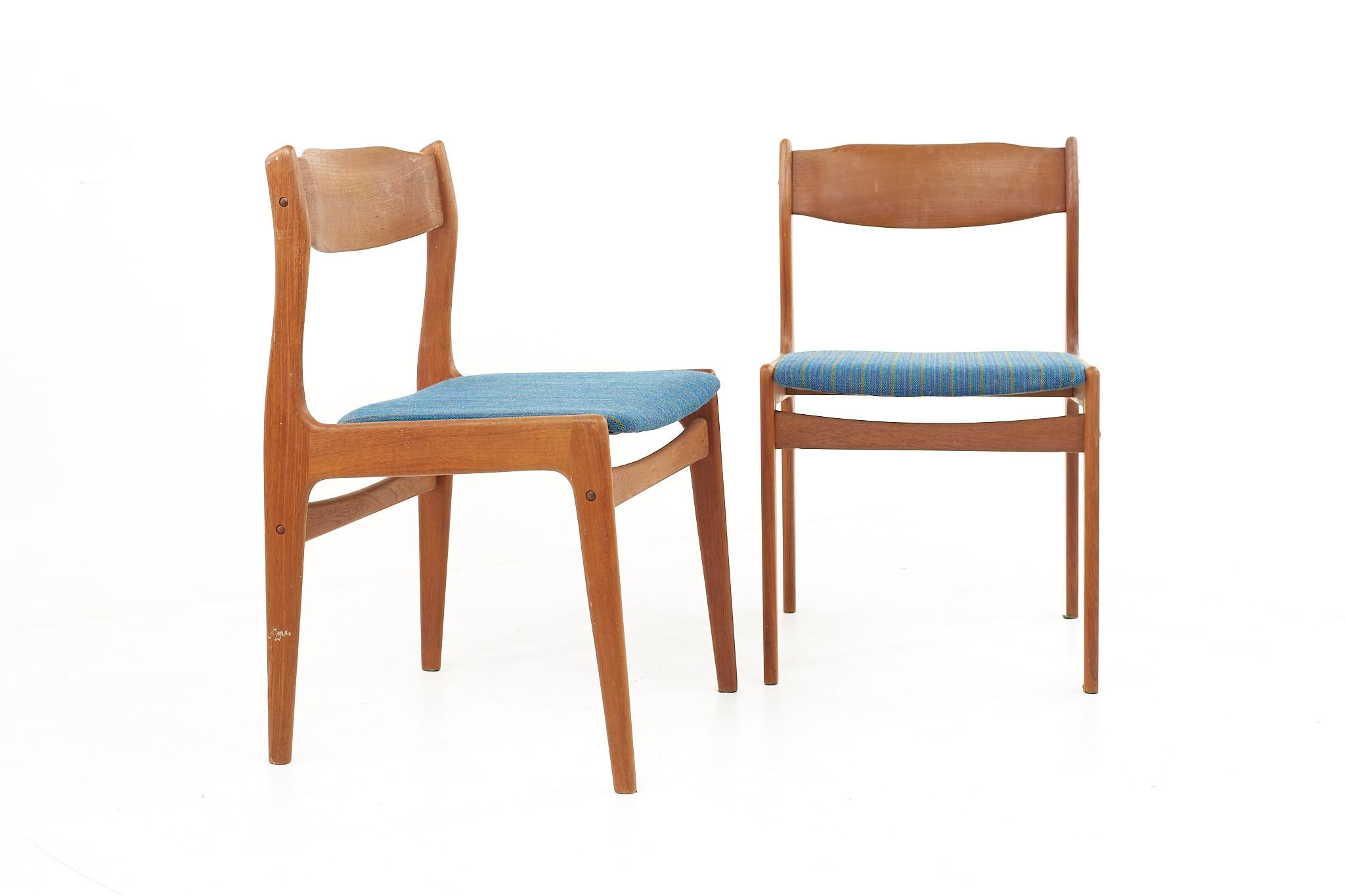 Mid century danish teak side chairs - a pair

Each chair measures: 19 wide x 19 deep x 30.5 high, with a seat height of 17.5 inches 

All pieces of furniture can be had in what we call restored vintage condition. That means the piece is restored
