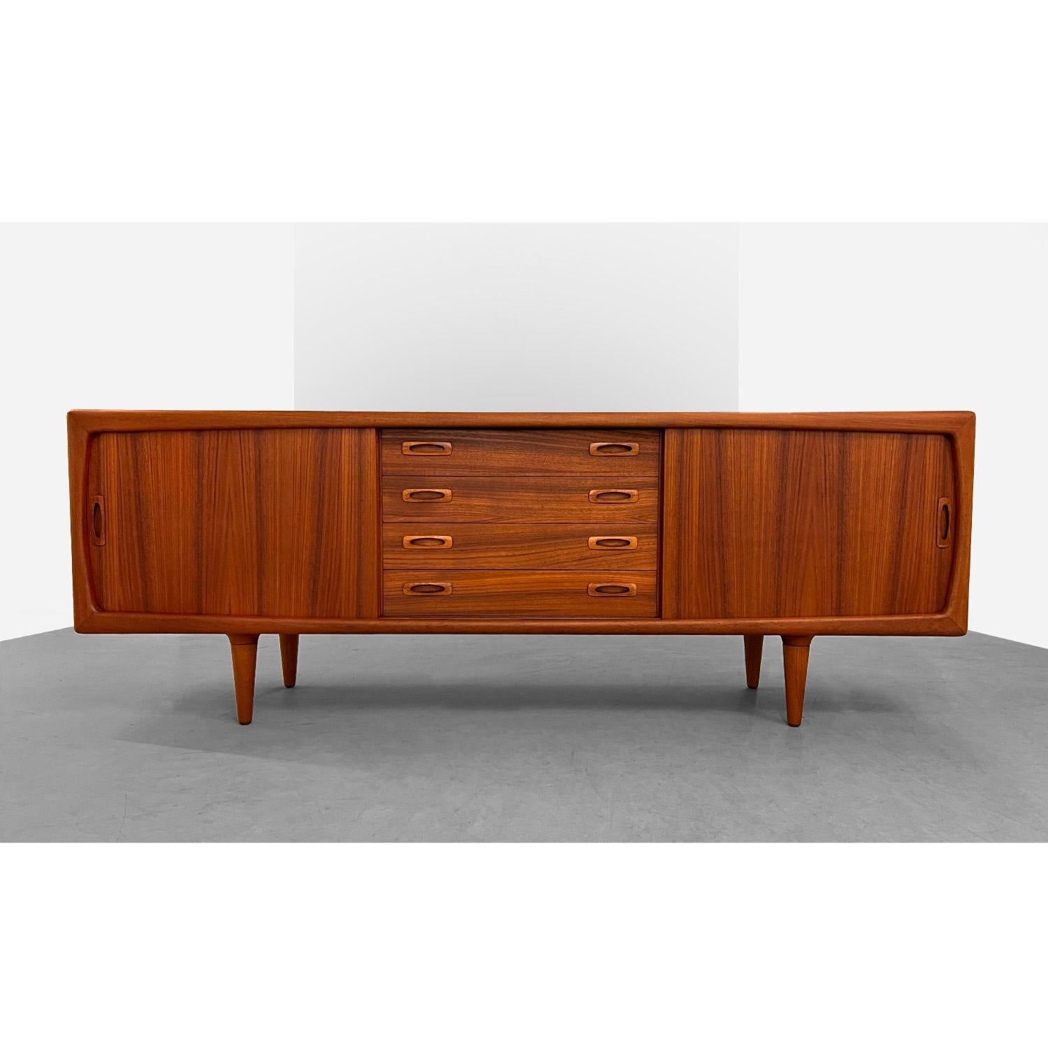 This vintage Danish teak sideboard by H.P. Hansen from the 1960's makes quite a statement at 87