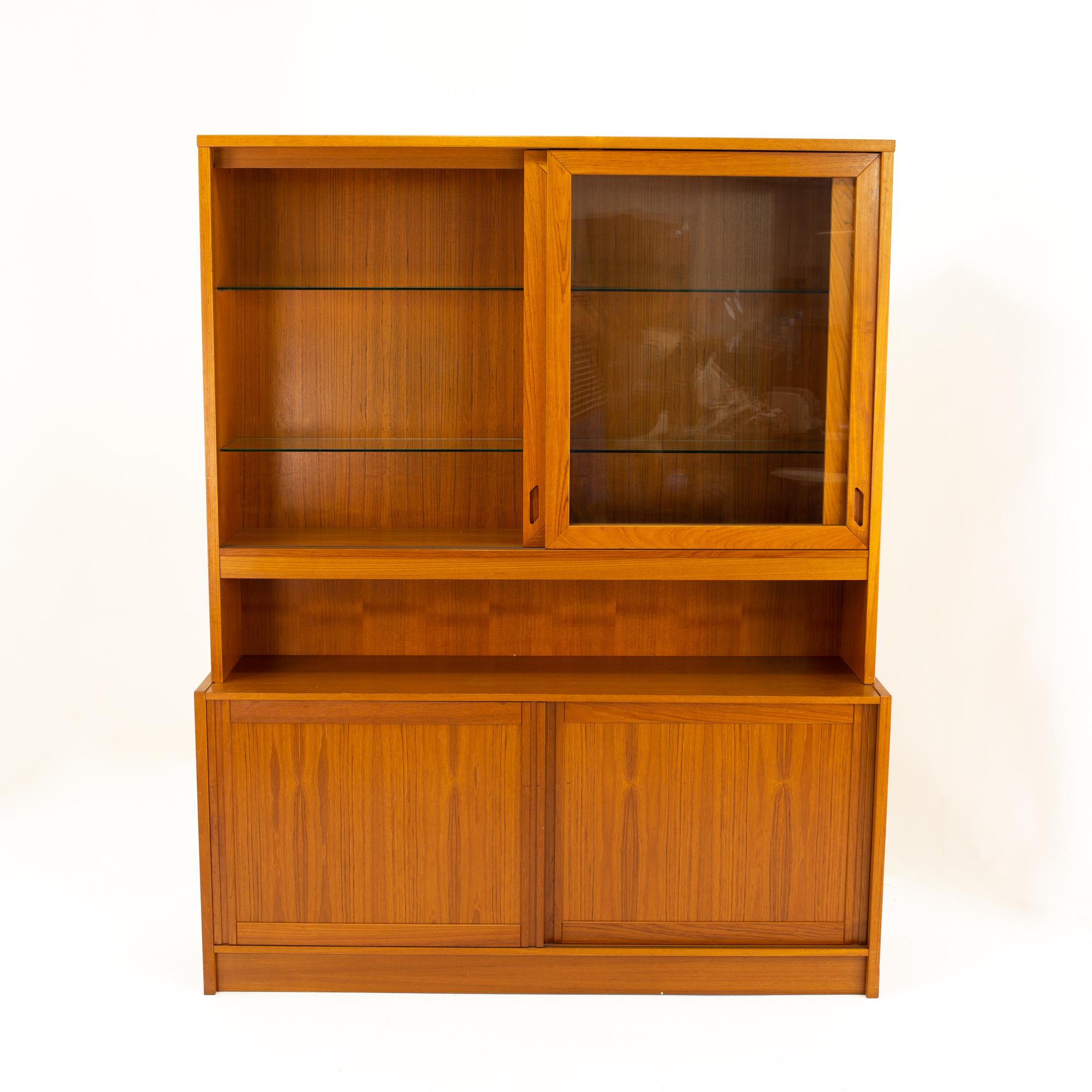 Mid century Danish teak sliding door credenza buffet and hutch
Credenza and hutch measures: 60 wide x 16 deep x 74.5 high

All pieces of furniture can be had in what we call restored vintage condition. This means the piece is restored upon