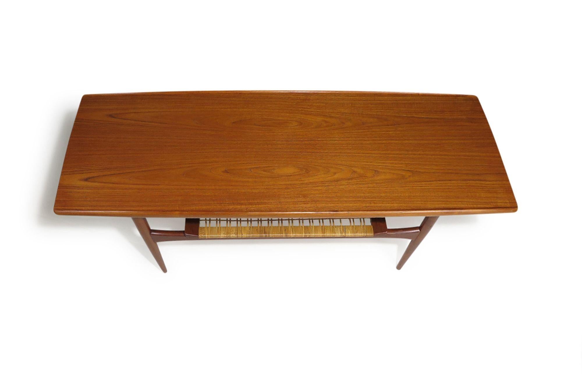 Mid-Century Danish Teak Two-Tier Coffee Table with Sculpted Edges & Caned Shelf For Sale 5