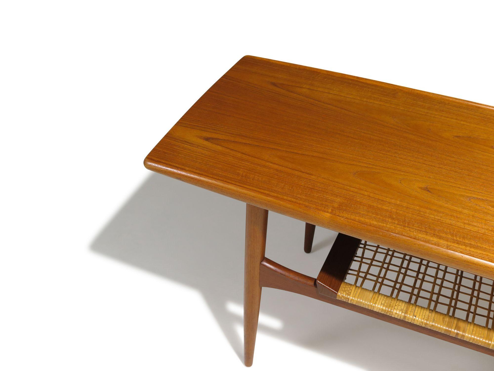 Scandinavian Modern Mid-Century Danish Teak Two-Tier Coffee Table with Sculpted Edges & Caned Shelf For Sale