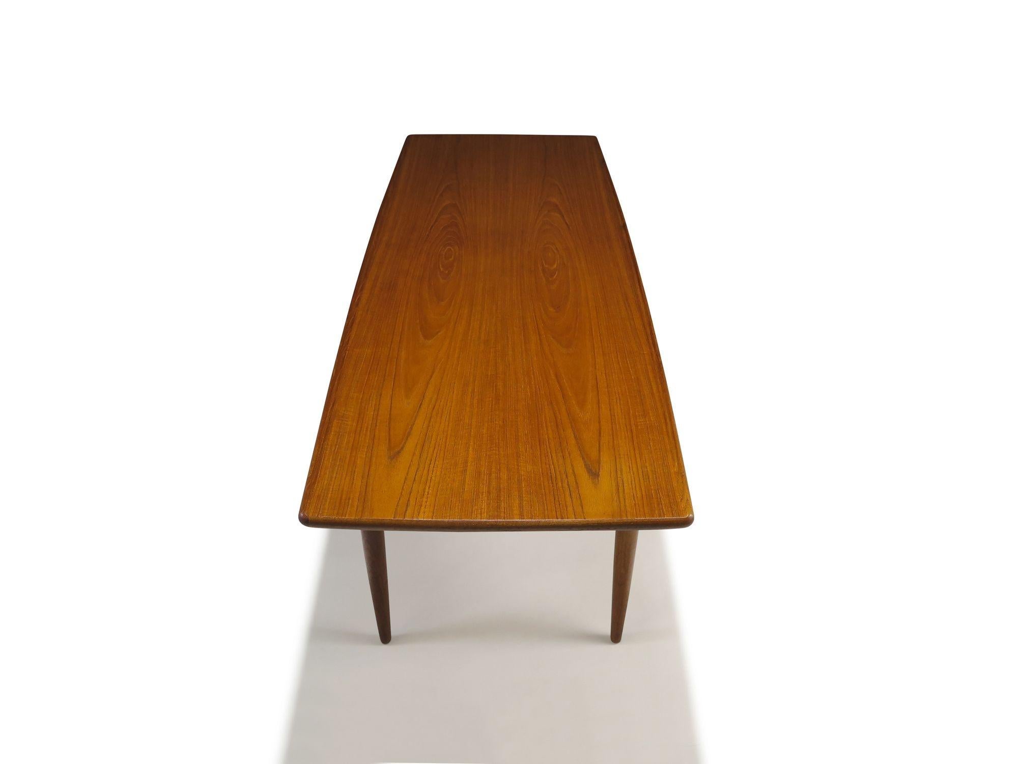 Mid-Century Danish Teak Two-Tier Coffee Table with Sculpted Edges & Caned Shelf For Sale 2