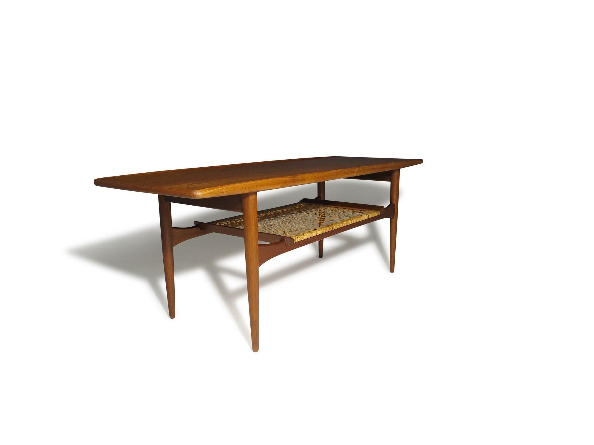Mid-Century Danish Teak Two-Tier Coffee Table with Sculpted Edges & Caned Shelf For Sale 3