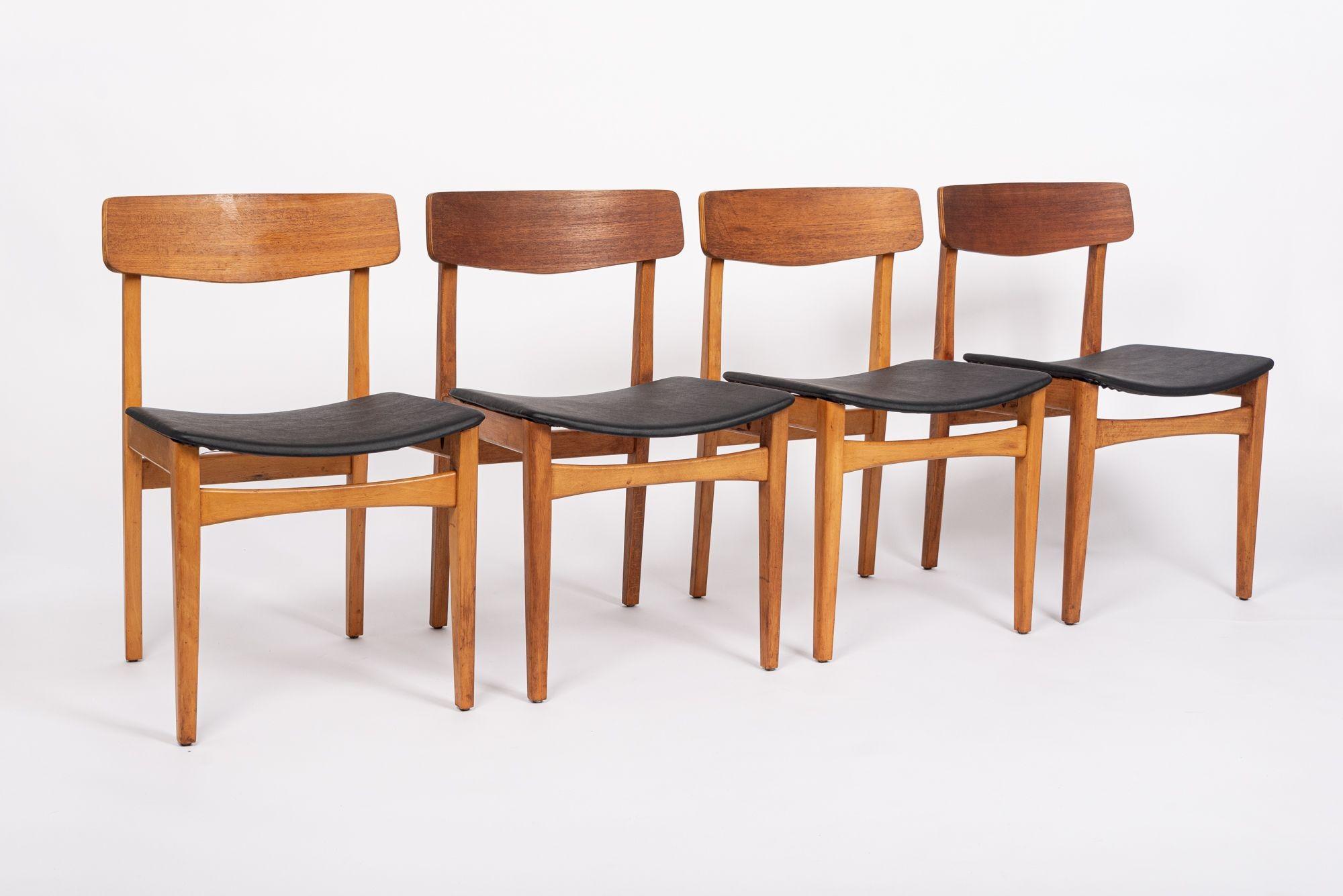 Mid Century Danish Teak Wood & Black Vinyl Dining Chairs In Good Condition For Sale In Detroit, MI